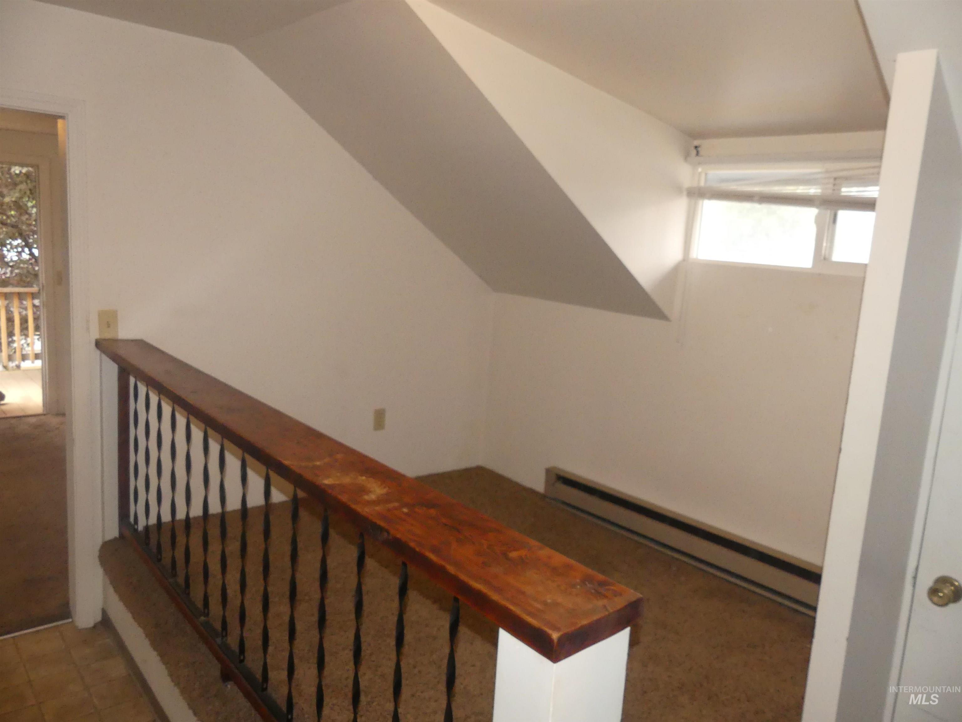 Stairway with baseboard heating