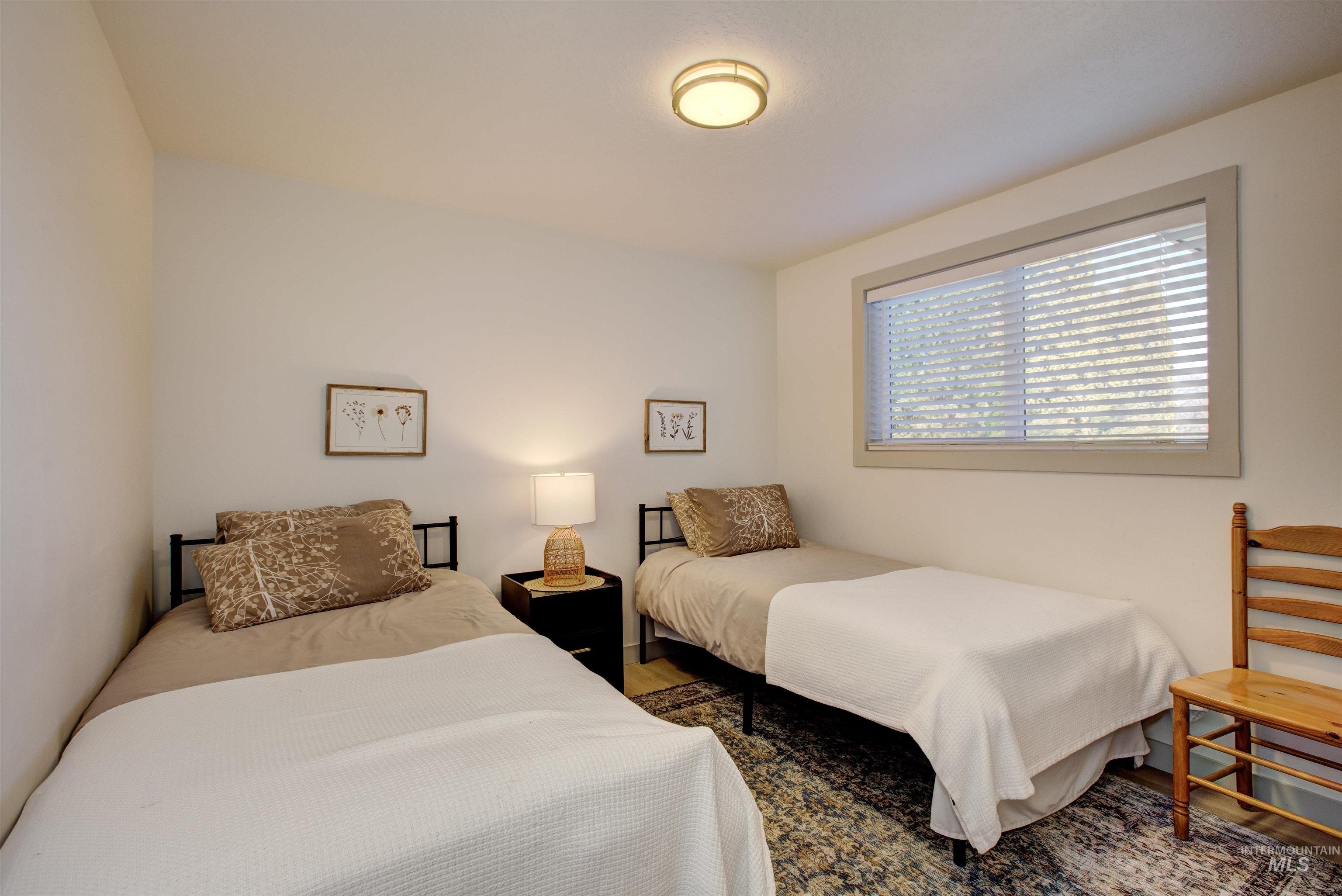 Bedroom featuring wood finished floors