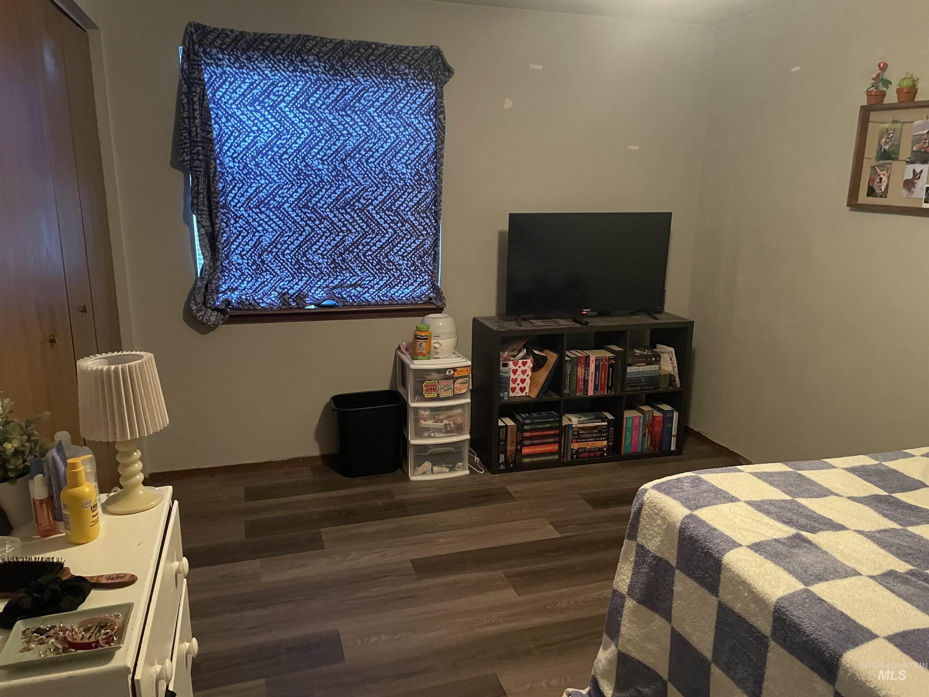 Bedroom featuring wood finished floors