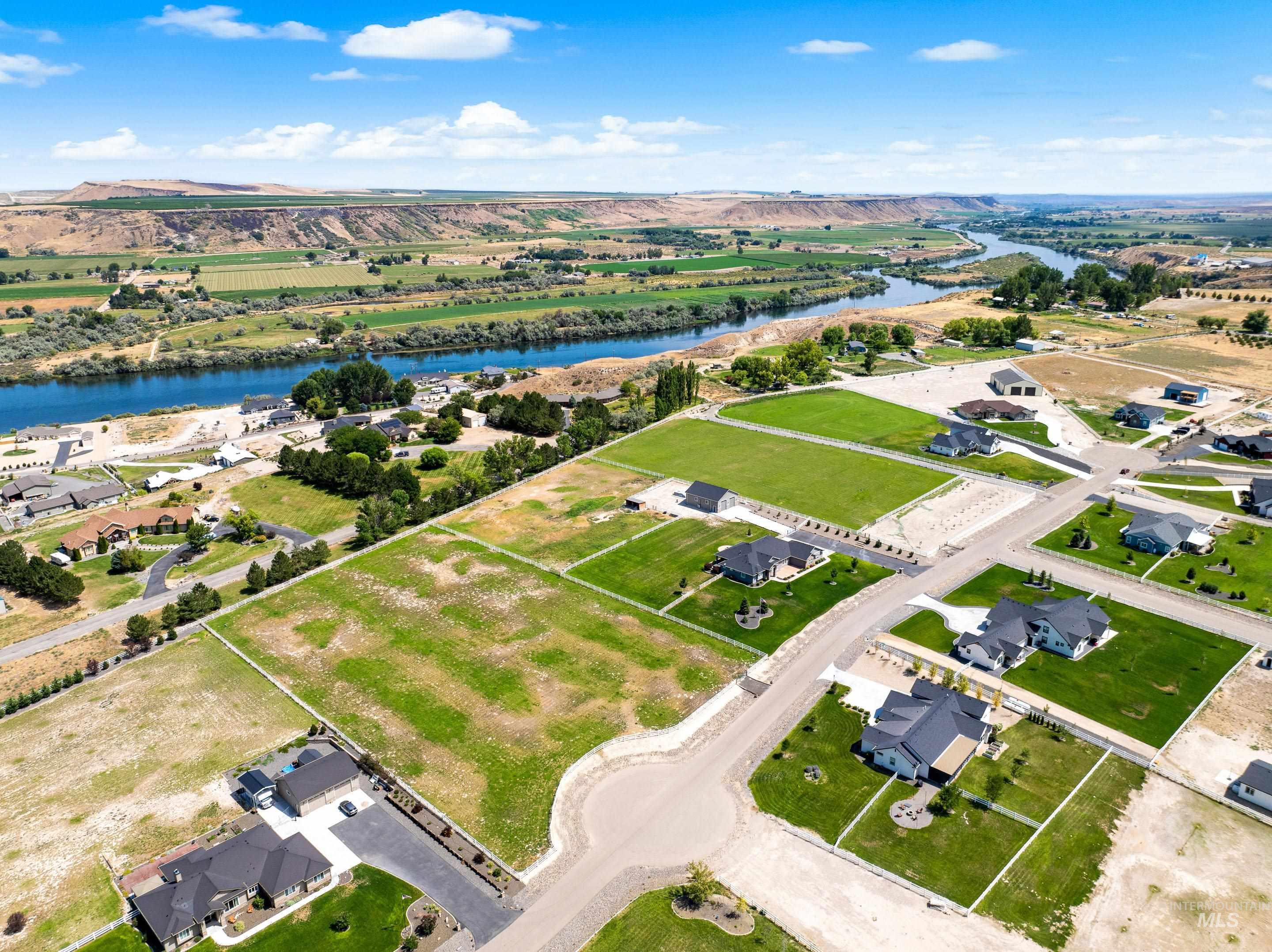 Aerial view of residential area with a nearby body of water