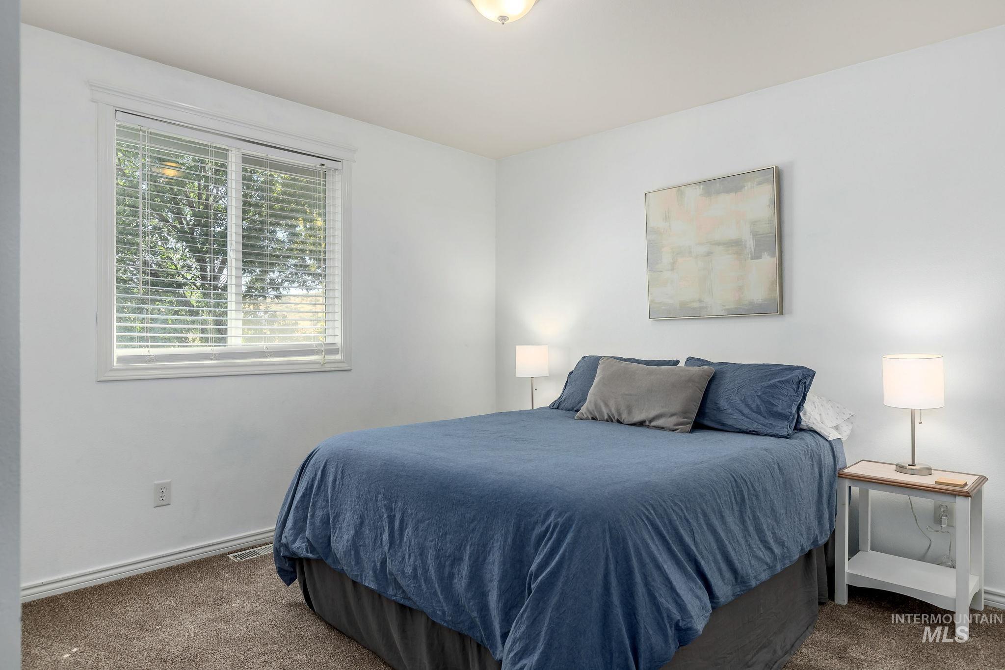 Bedroom featuring carpet floors