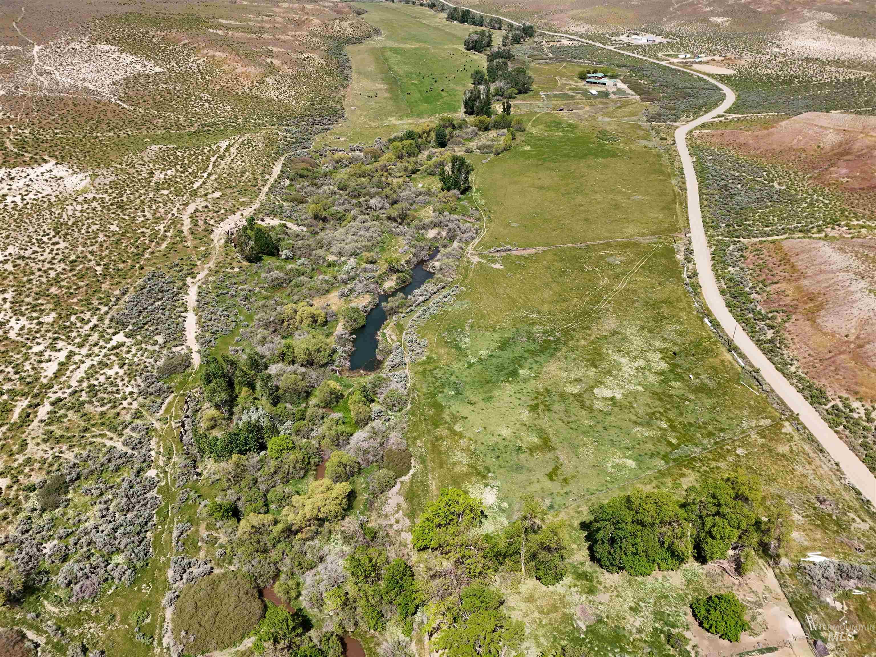 Aerial overview of property's location with rural landscape