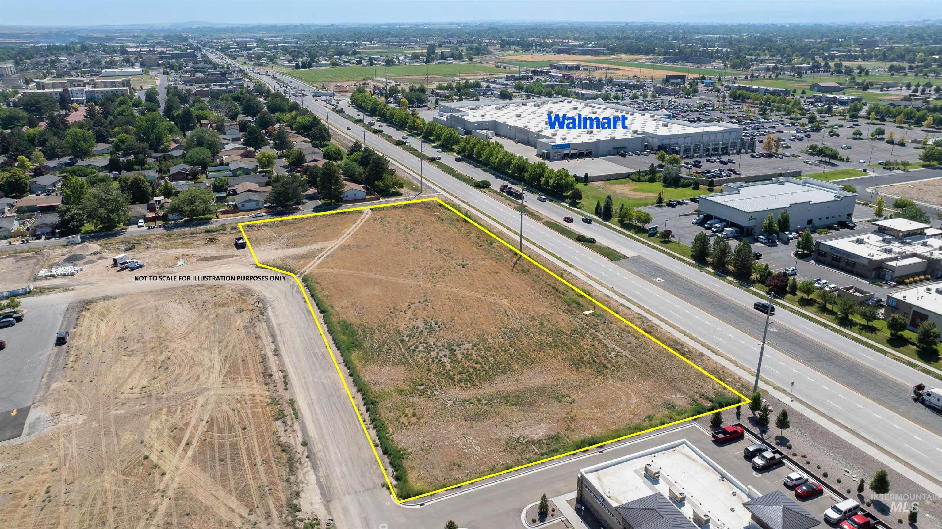 Aerial view of property and surrounding area with property boundaries highlighted