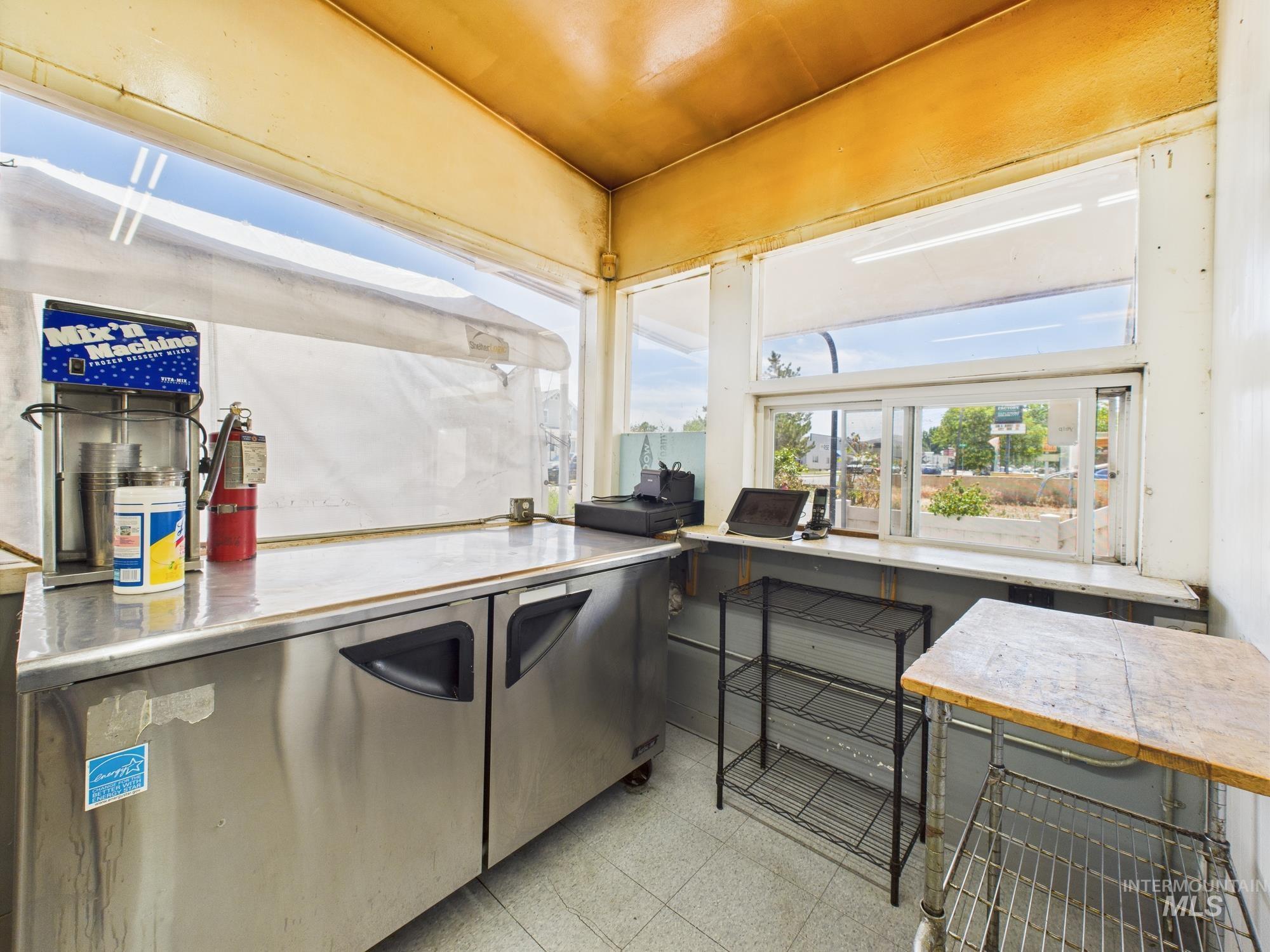 Exterior space featuring light flooring