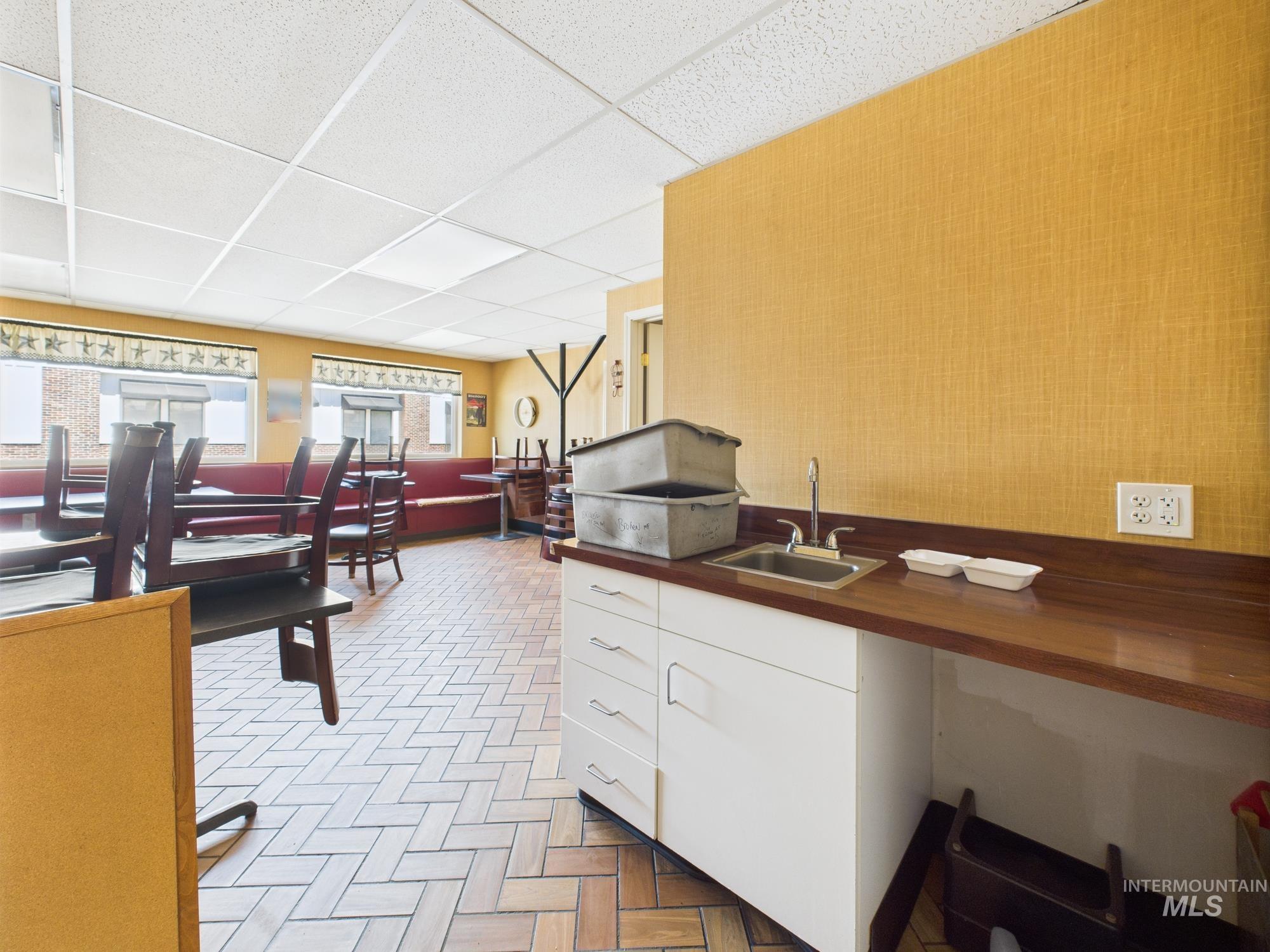 Misc room featuring a paneled ceiling