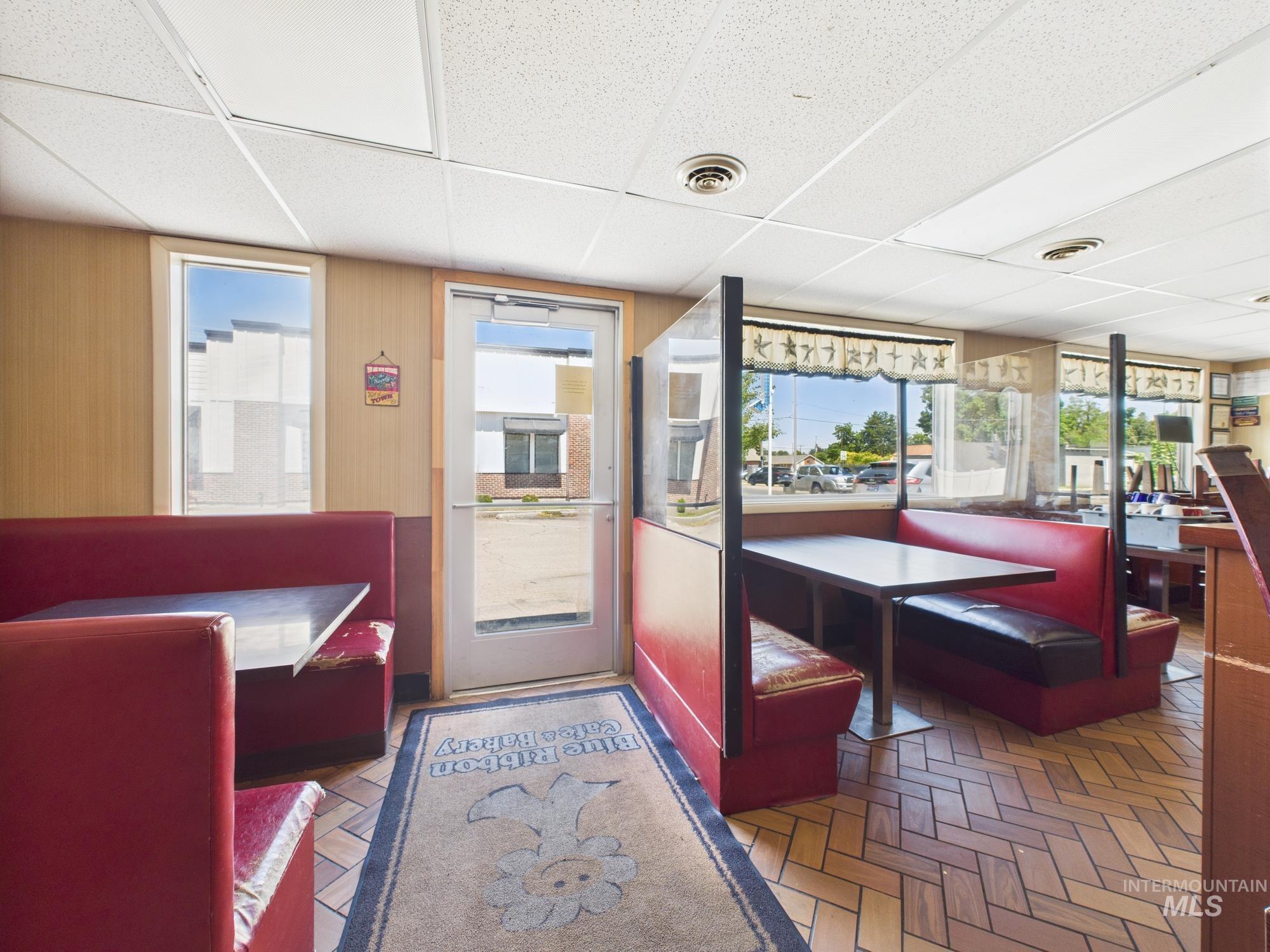 Common area with a drop ceiling