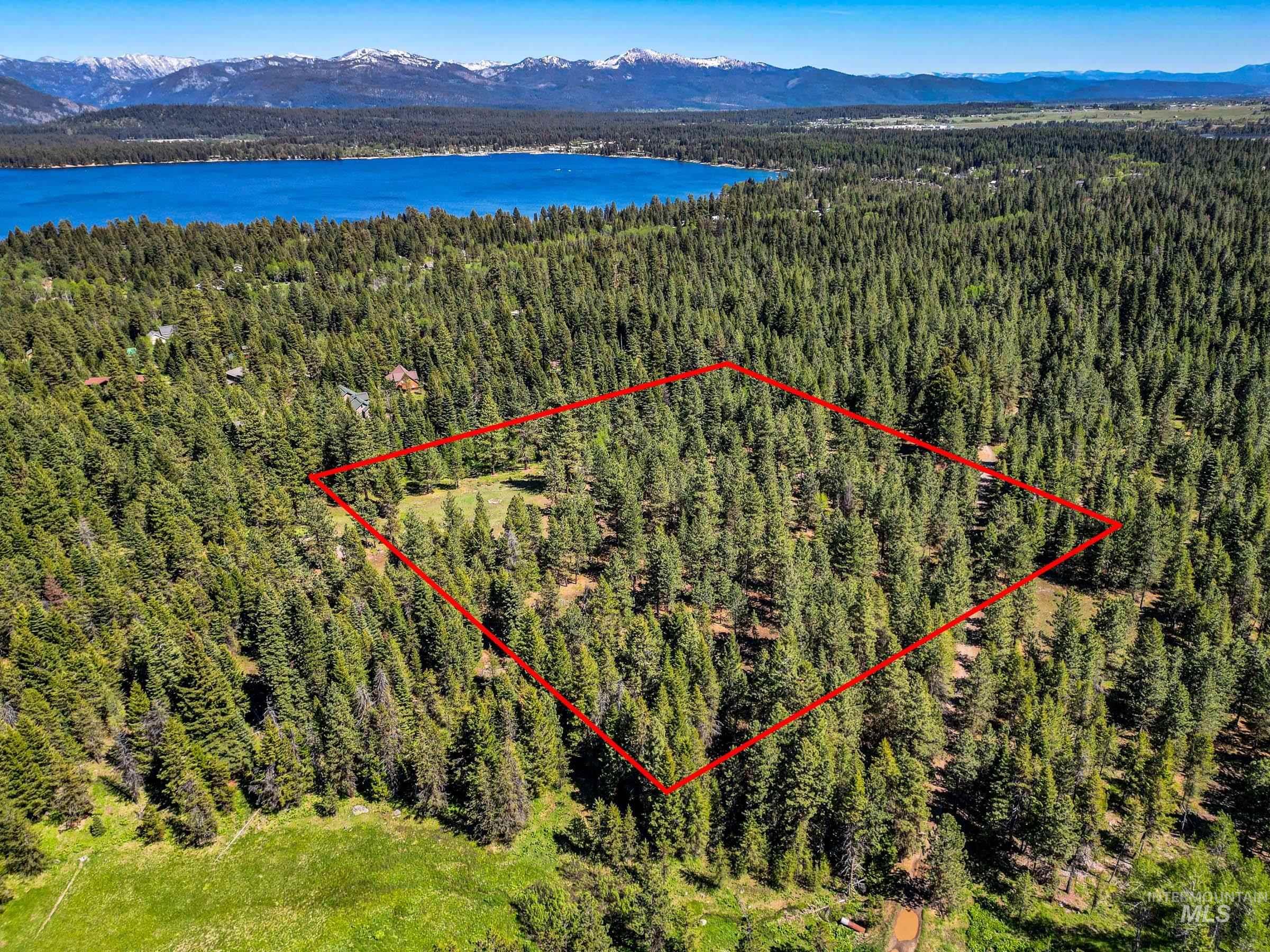 Aerial overview of property's location with mountains and property boundaries highlighted