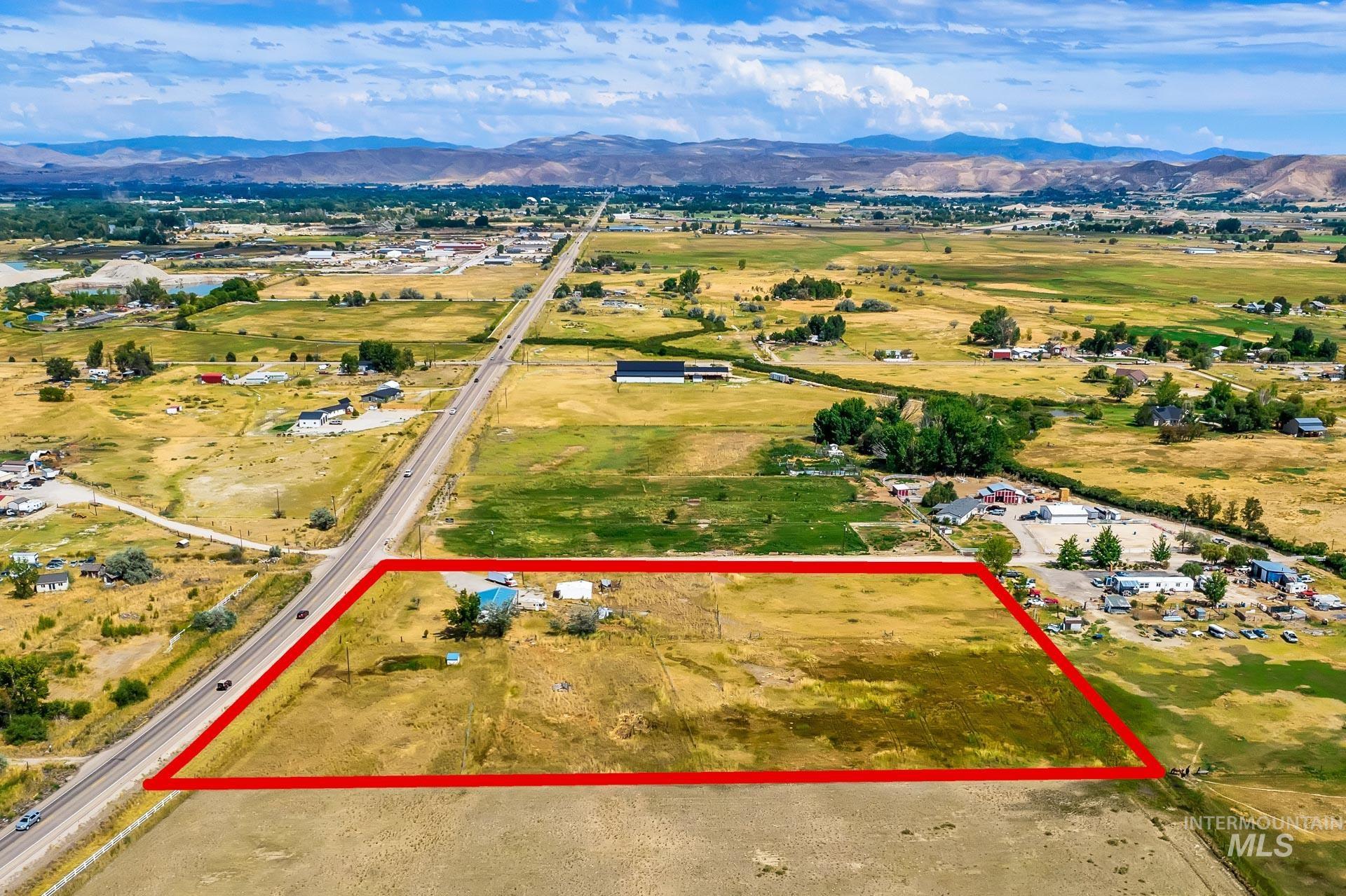 Aerial view of property's location with property boundaries highlighted and rural landscape
