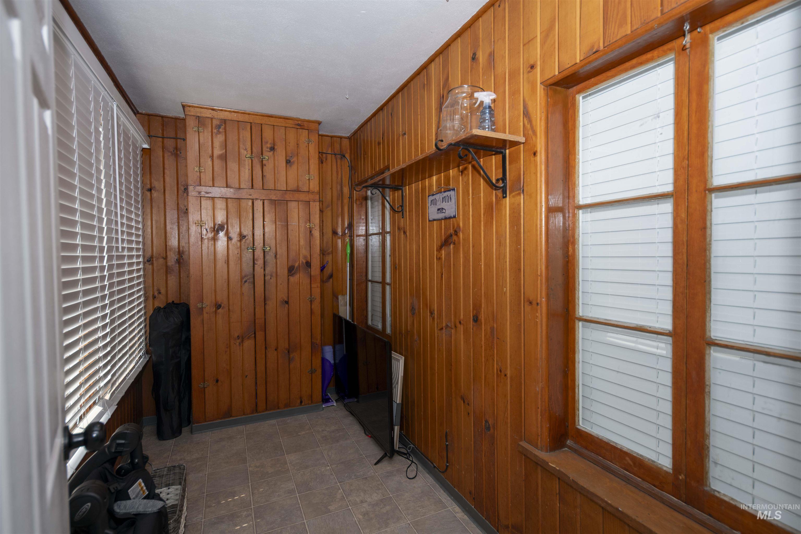 Storage by the kitchen, near the backdoor