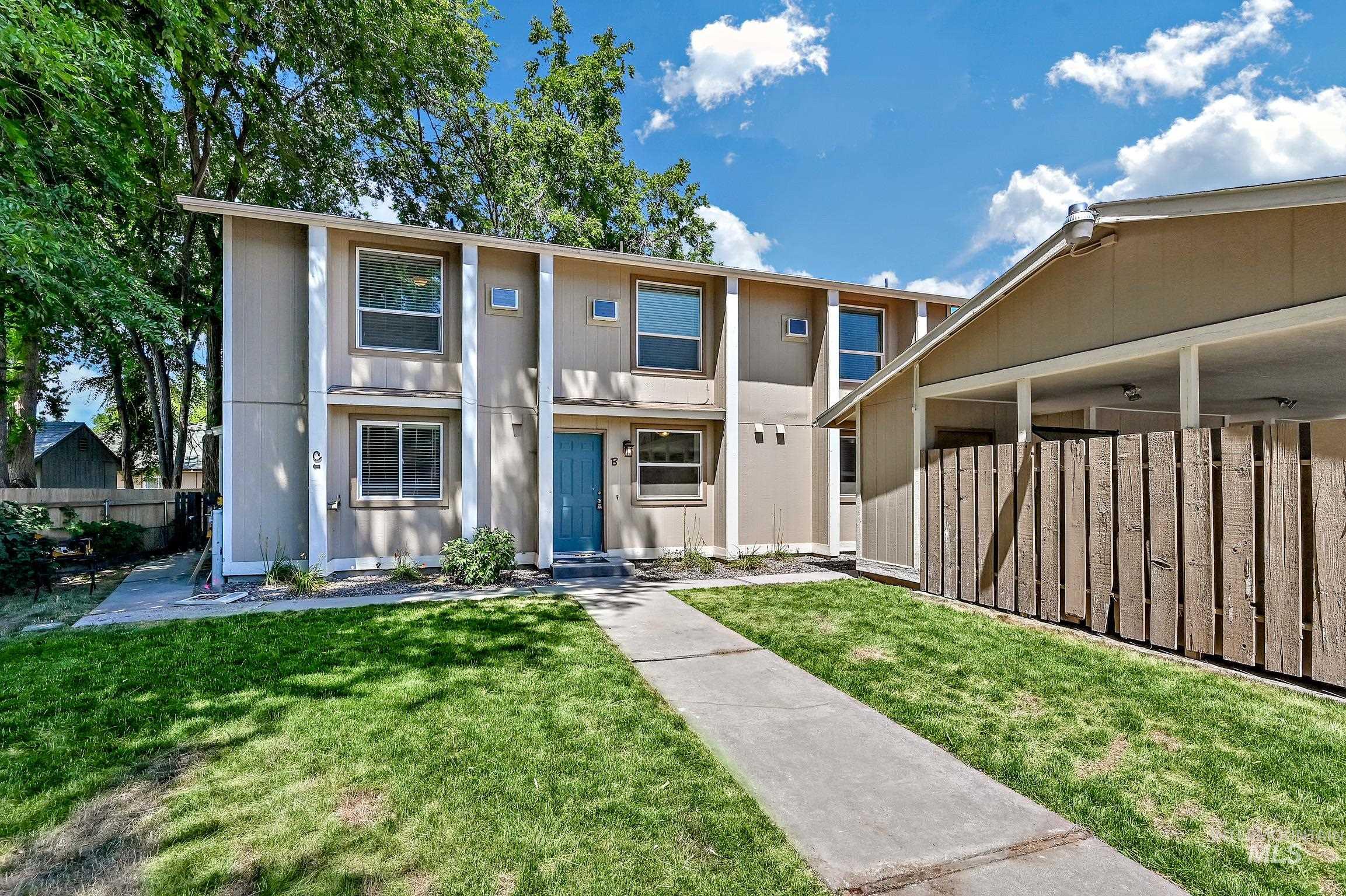 Unit C: Entry is at the left side of the building, in this view. Blue door is entry to Unit B.