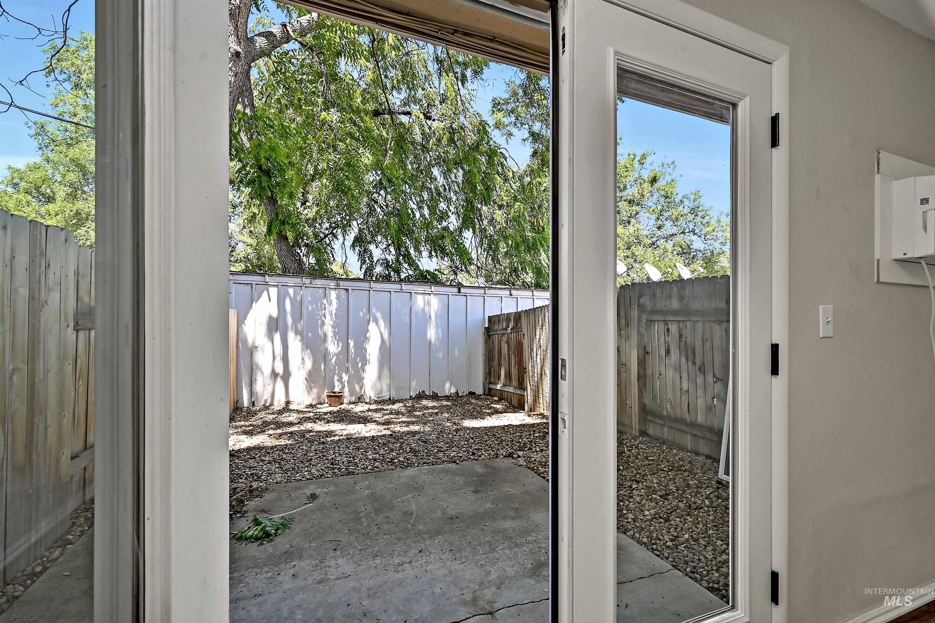 Unit B: Doorway to the back patio and yard space