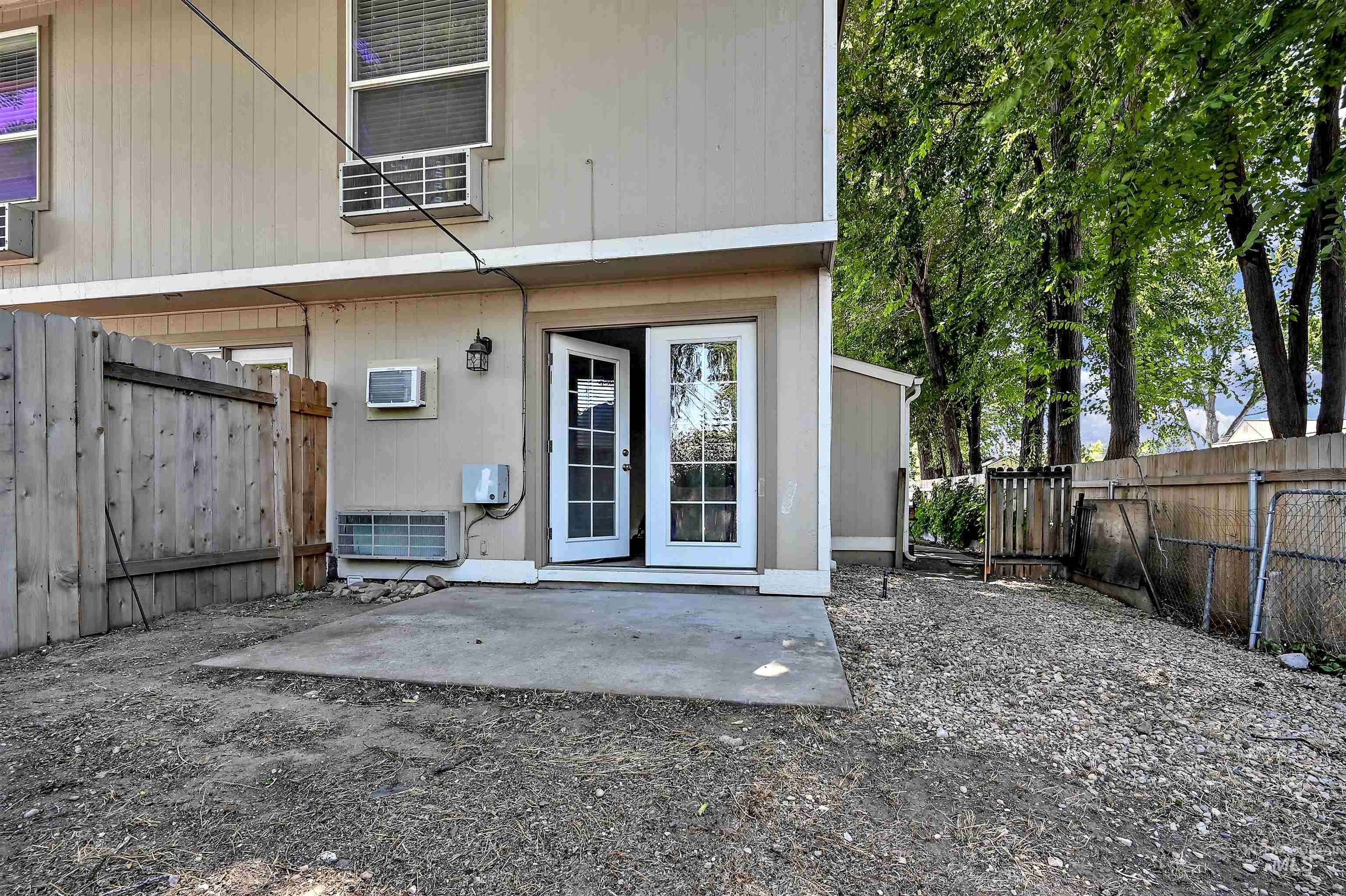 Unit C: Back yard featuring a patio area