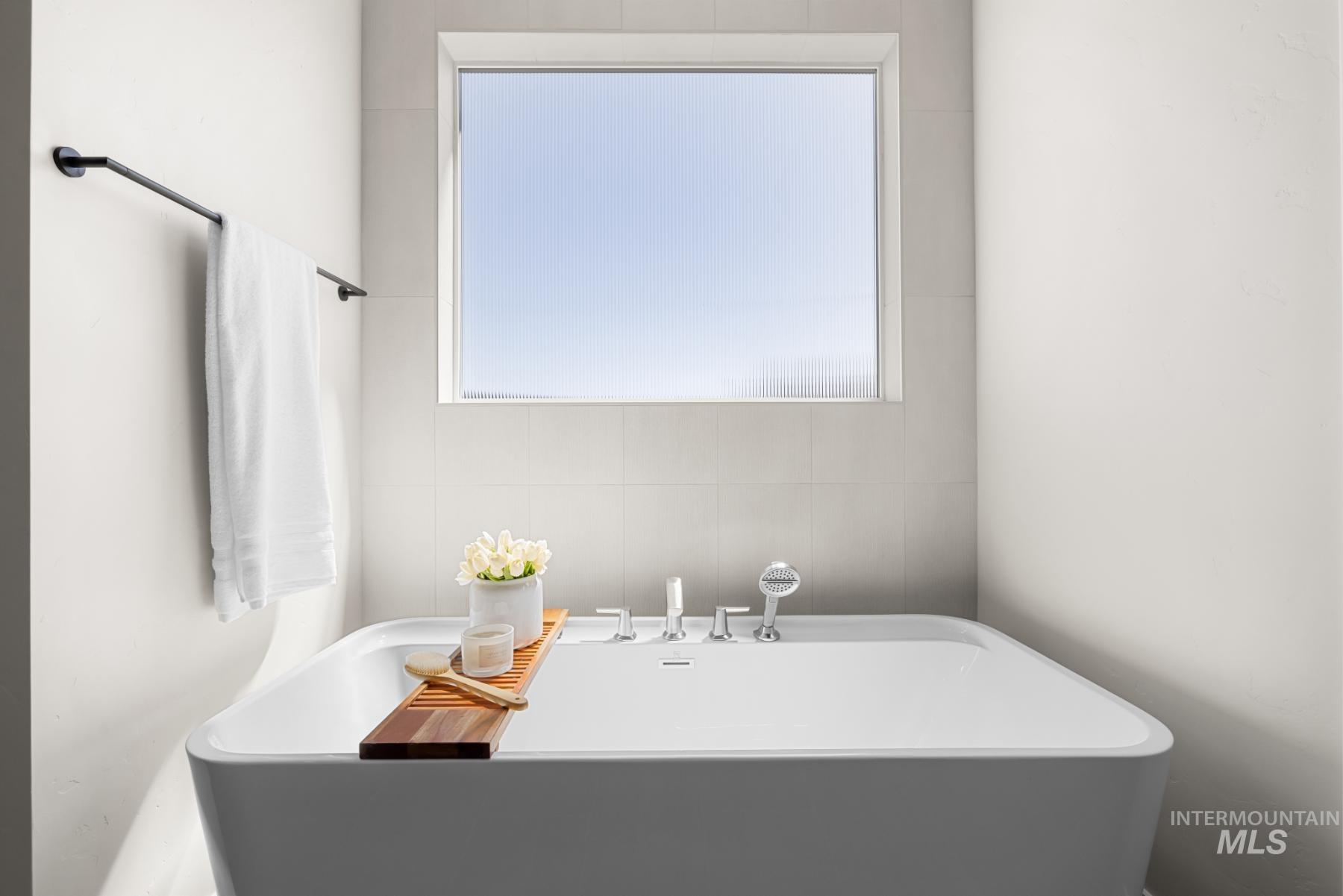 Bathroom featuring a soaking tub
