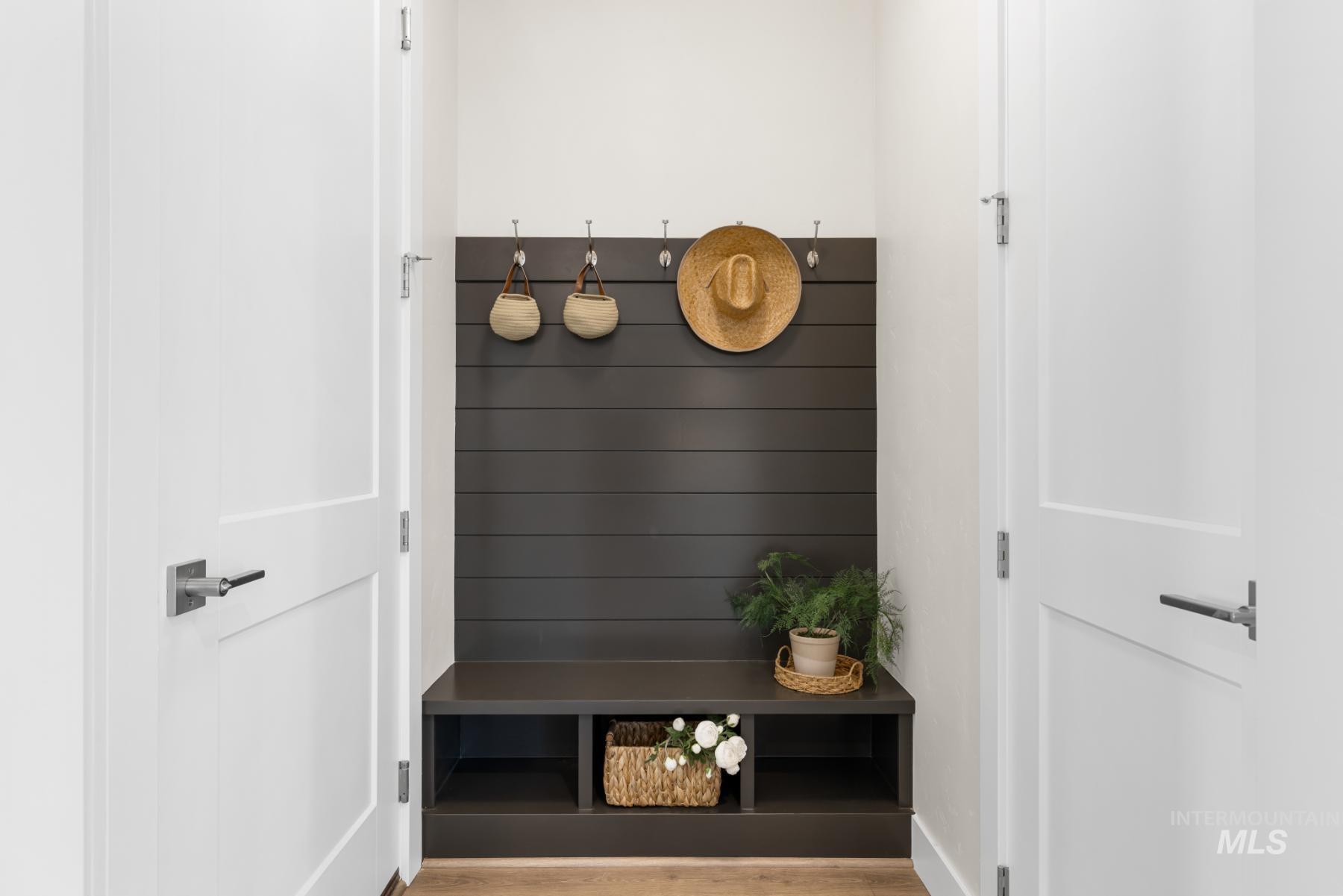 Mudroom featuring wood finished floors