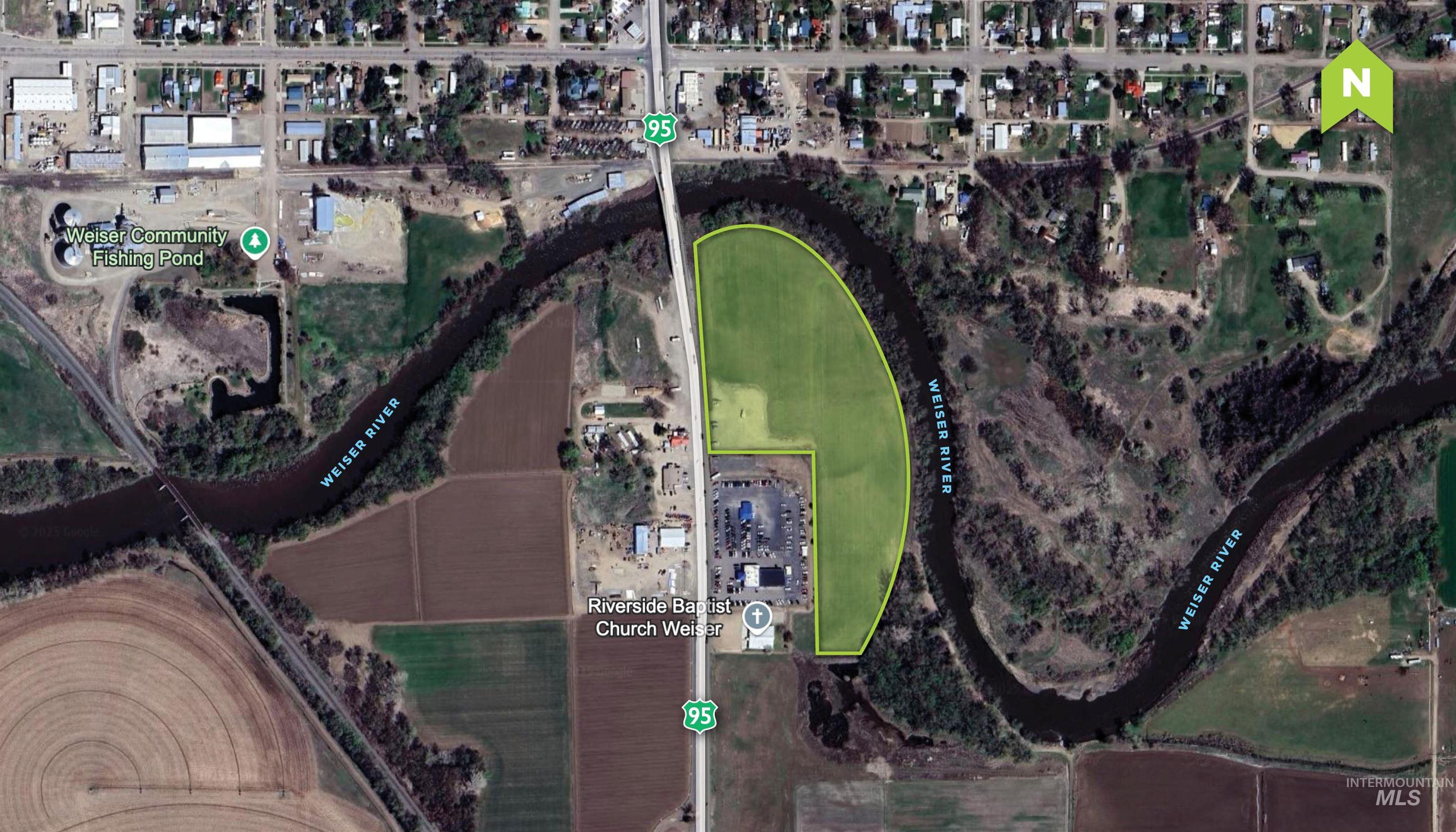 Aerial overview of property's location featuring property parcel outlined