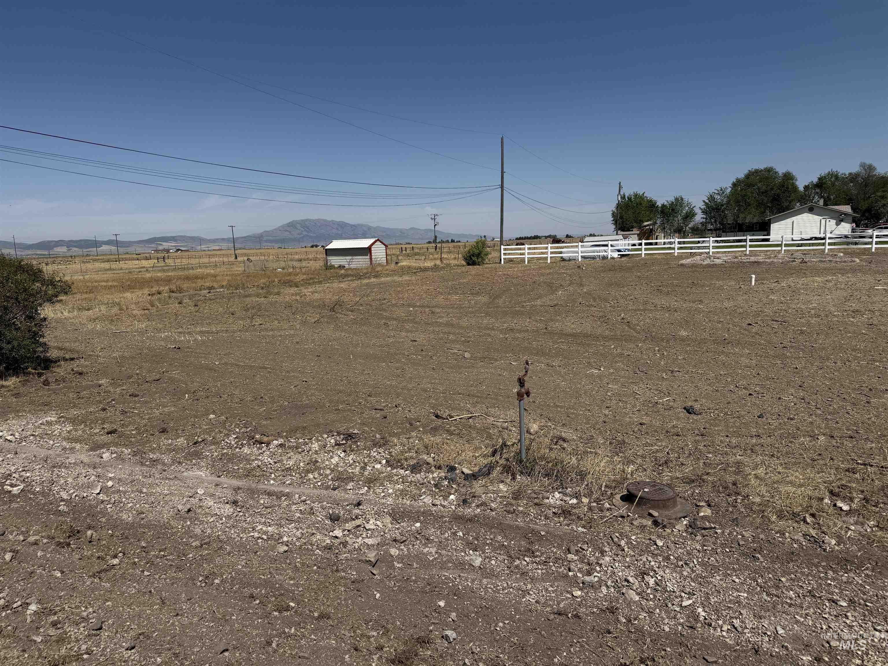 View of yard with a view of countryside and a mountain view