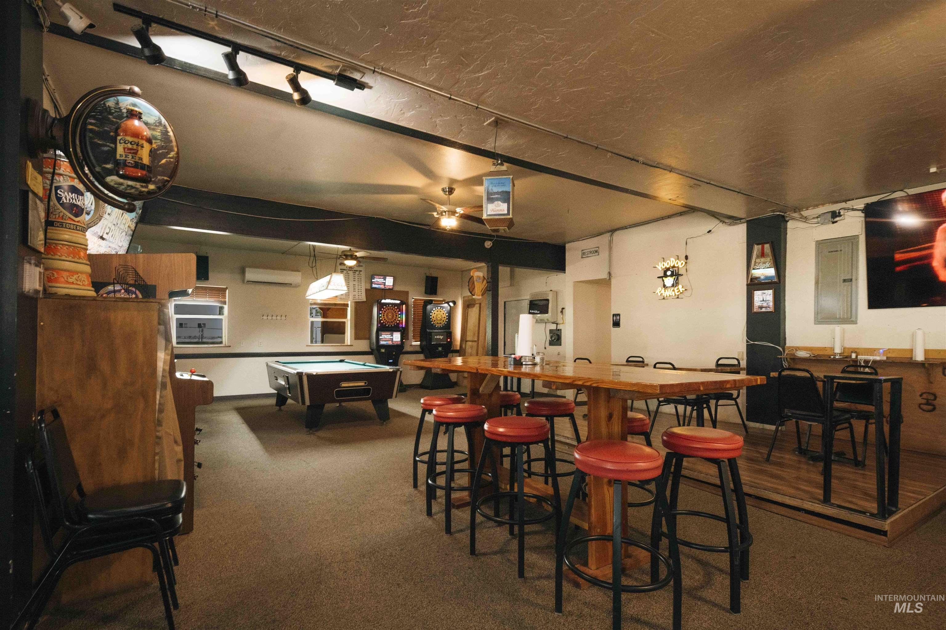Bar area featuring billiards table and carpet floors