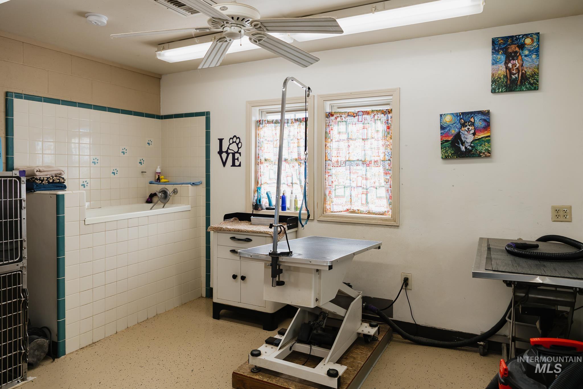 Workout area with ceiling fan