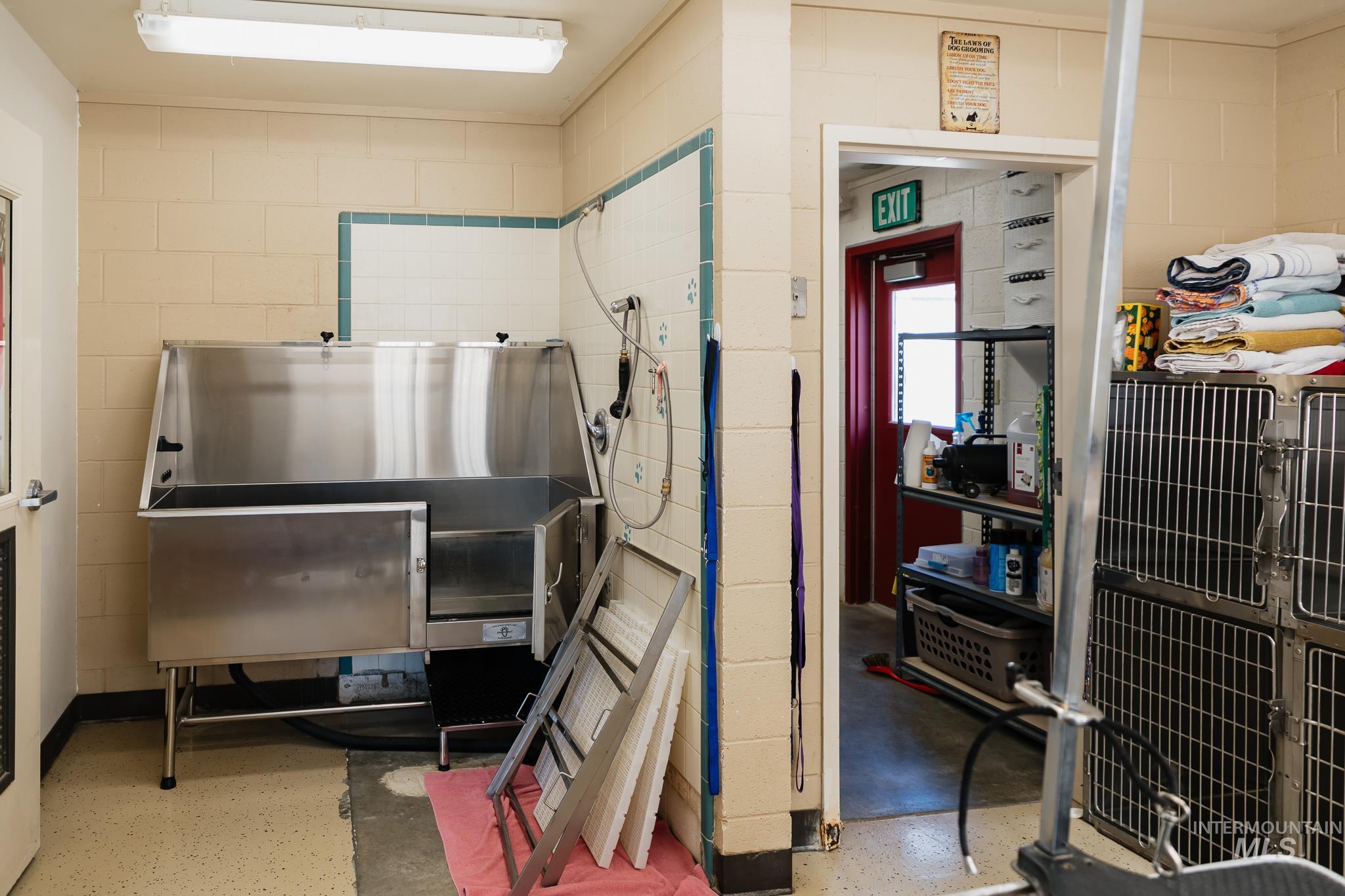 Miscellaneous room with pet washing station
