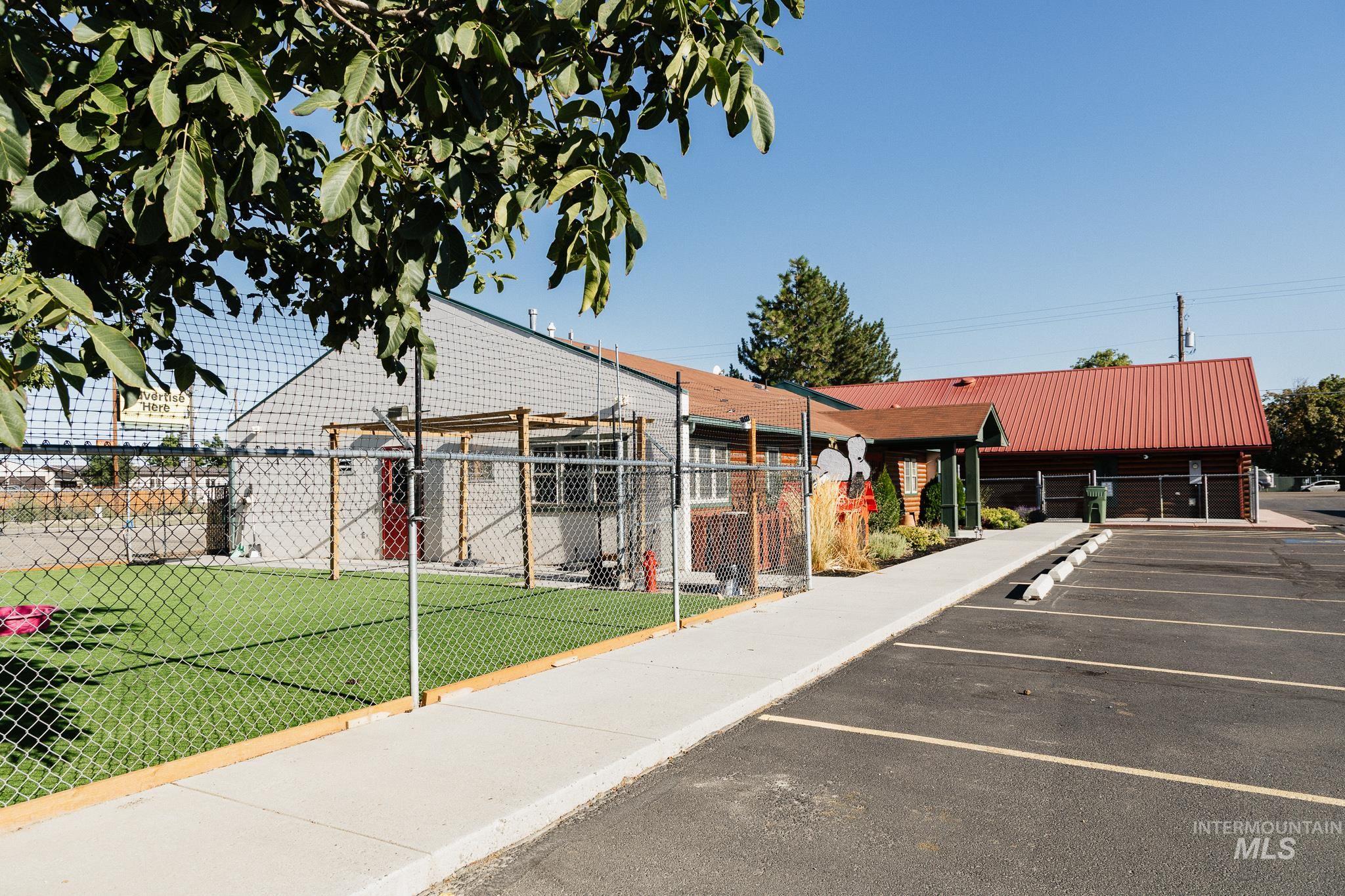 View of front of home featuring uncovered parking