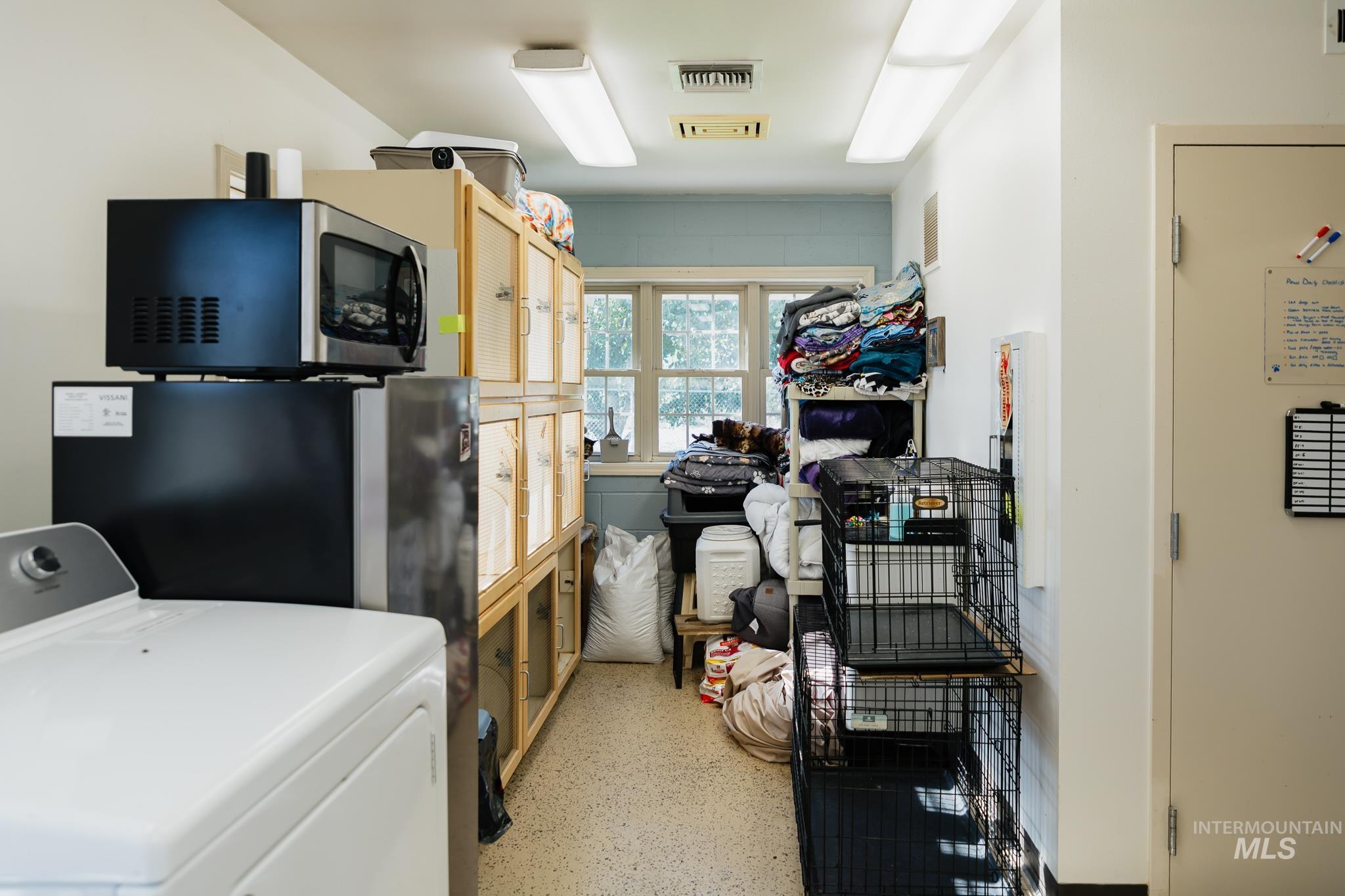 Laundry area featuring washer / dryer