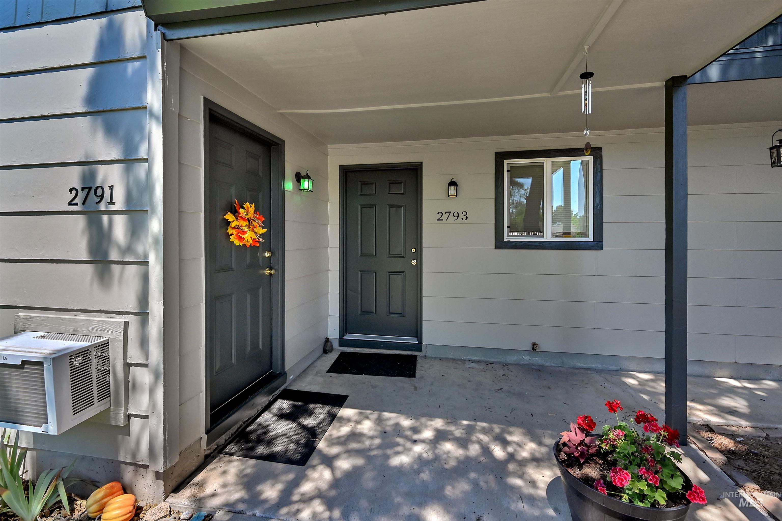 Property entrance with covered porch