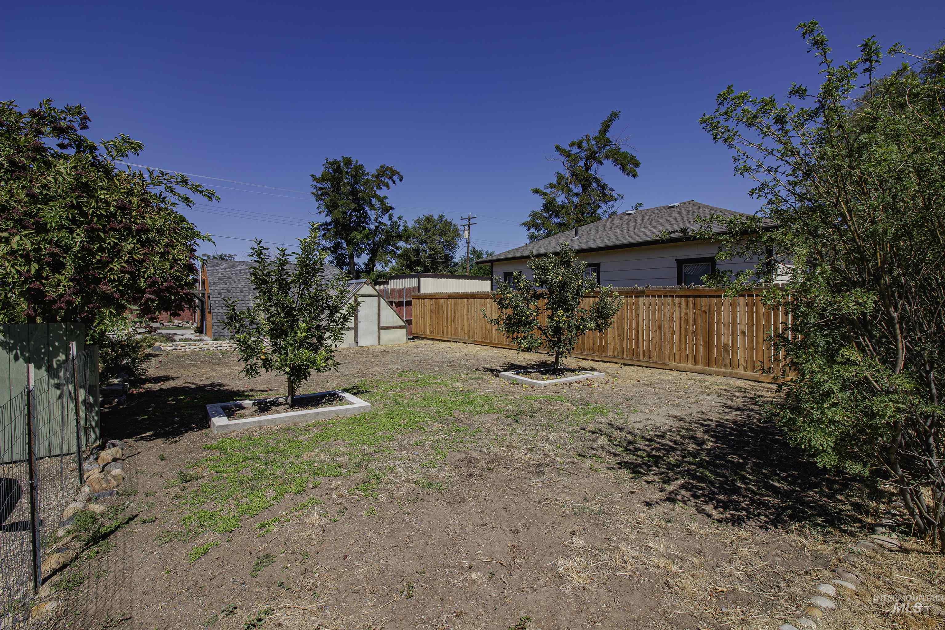 Large private yard with fruit trees or more parking