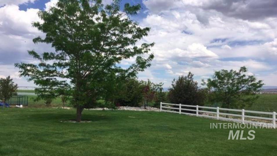 View of yard with a view of countryside