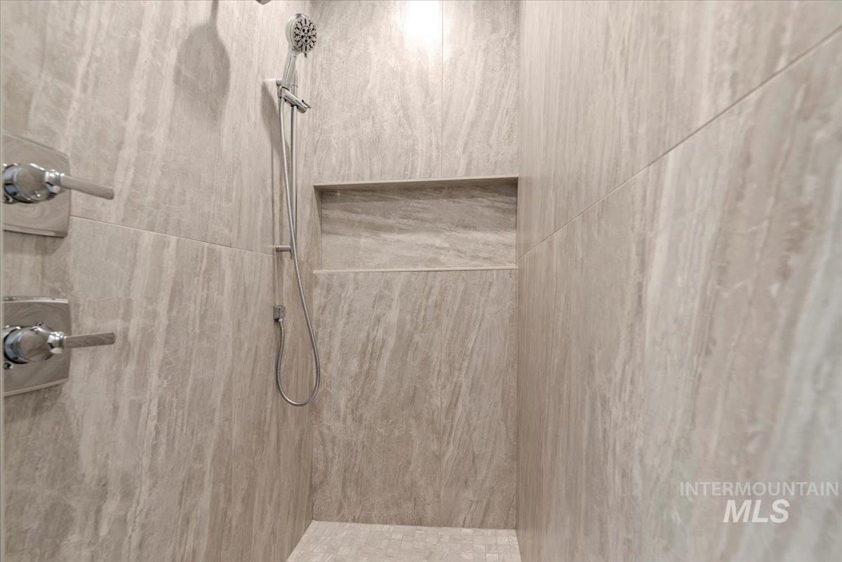 Bathroom with a tile shower