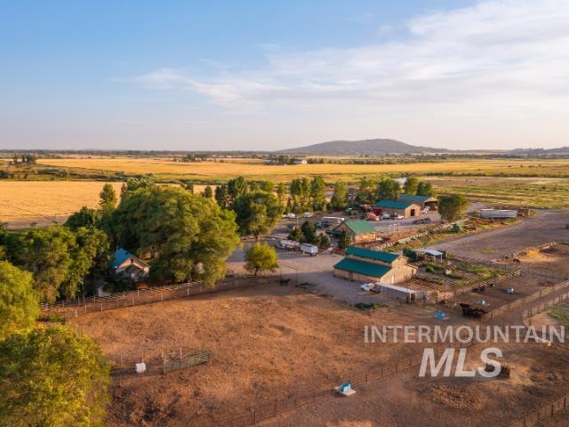 Aerial view of sparsely populated area featuring a mountainous background