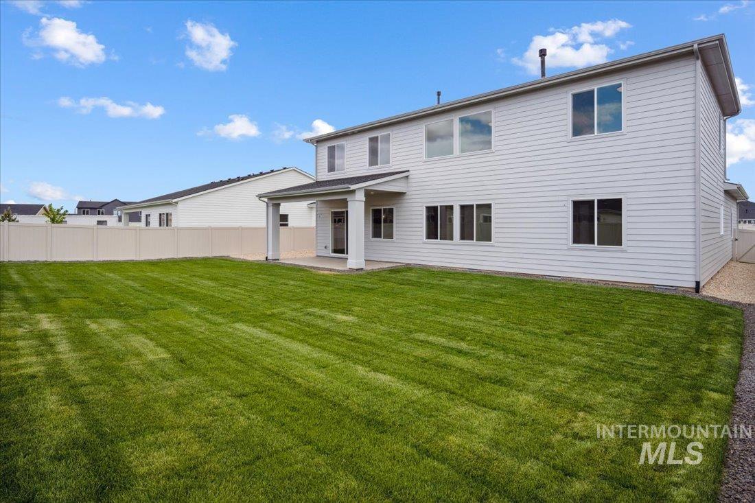Back of house featuring a patio area