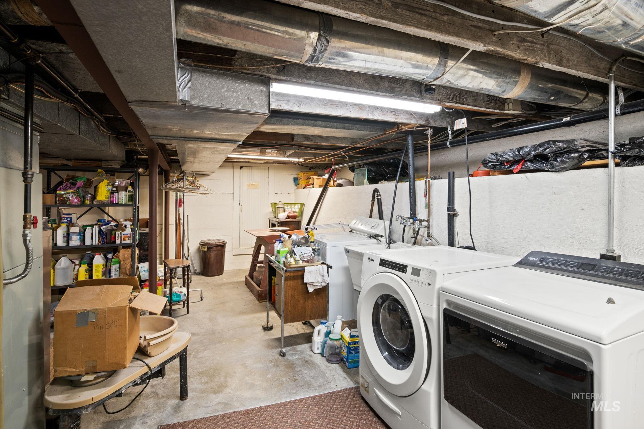 Laundry room with washer and dryer