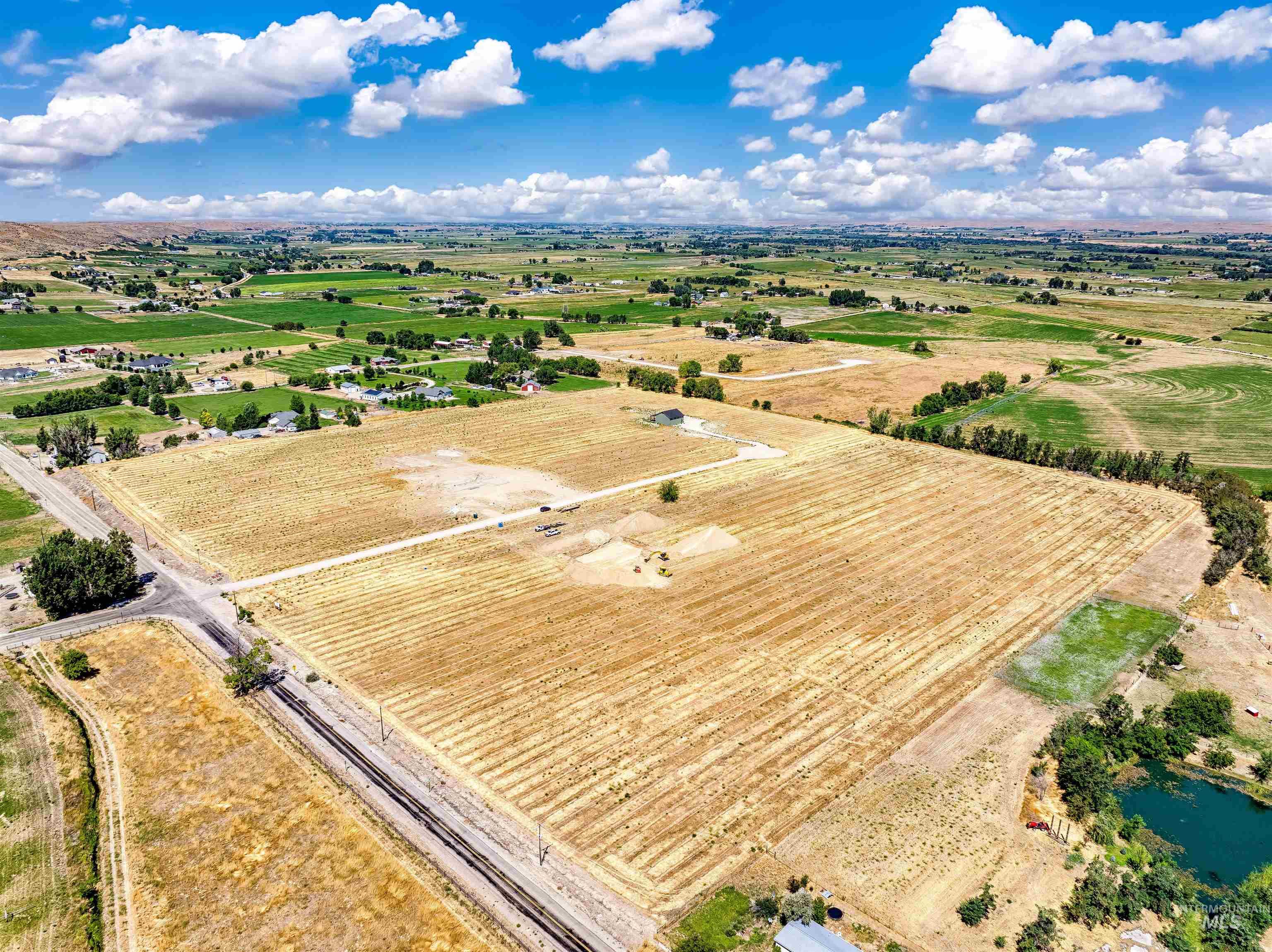 Overview of rural landscape featuring extensive farmland