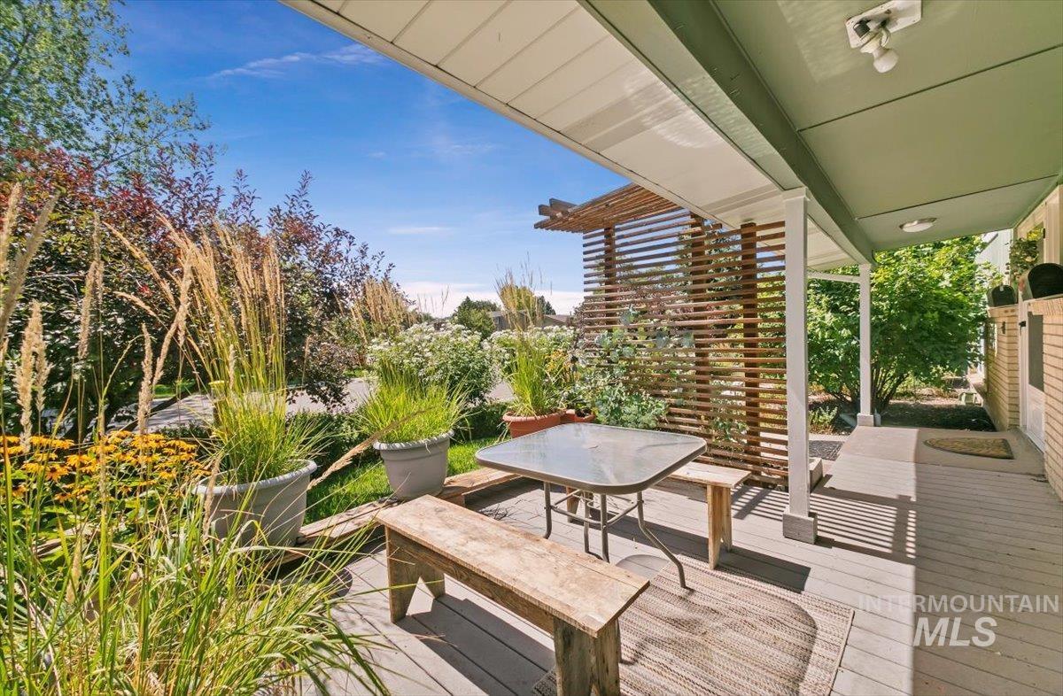 Wooden terrace with outdoor dining area