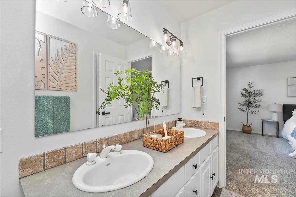 Ensuite bathroom with a sink