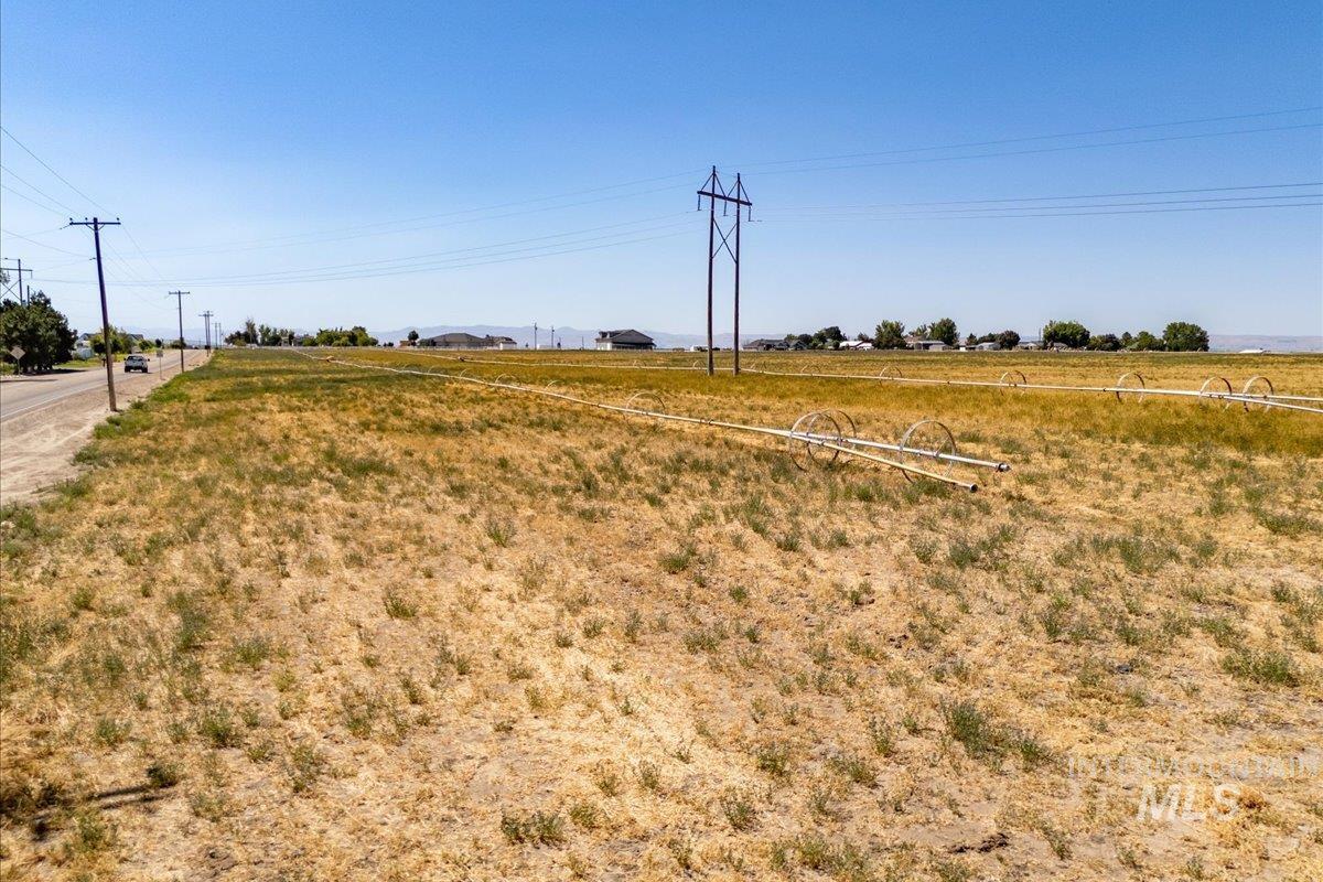 View of yard with a view of countryside
