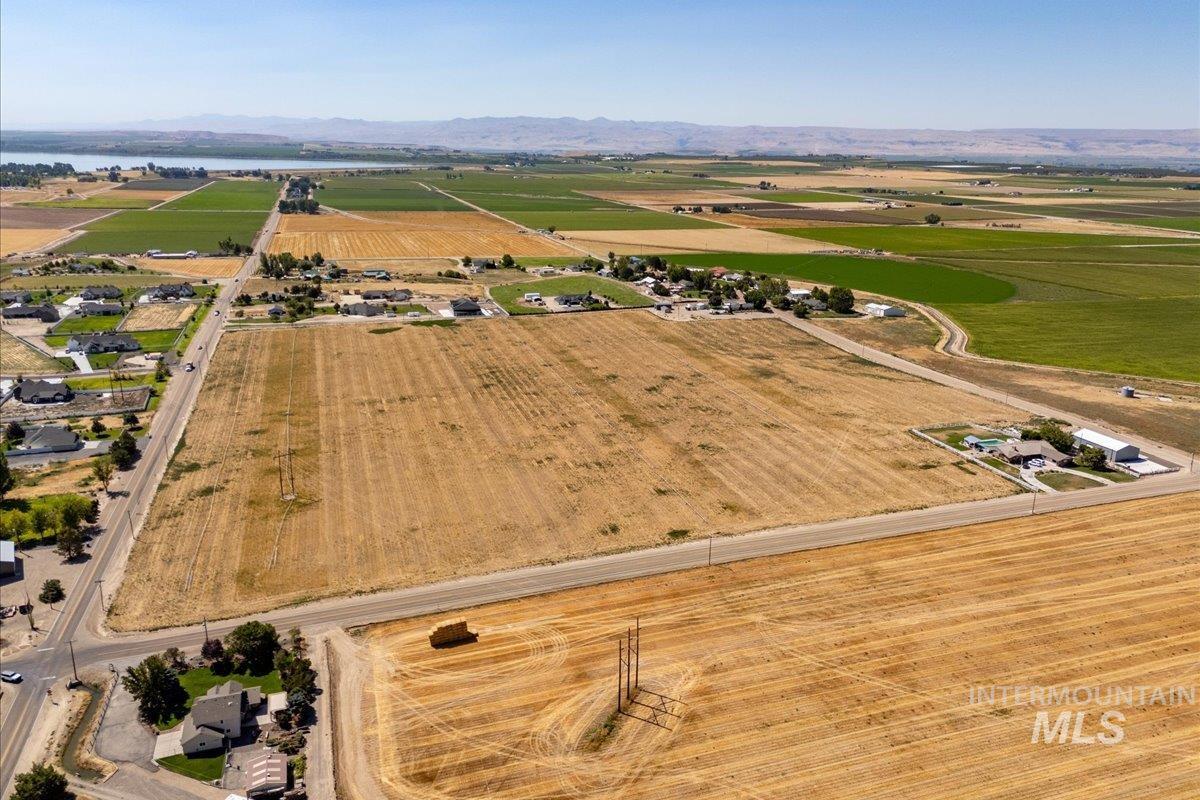 View of property location with mountains, rural landscape, and extensive farmland