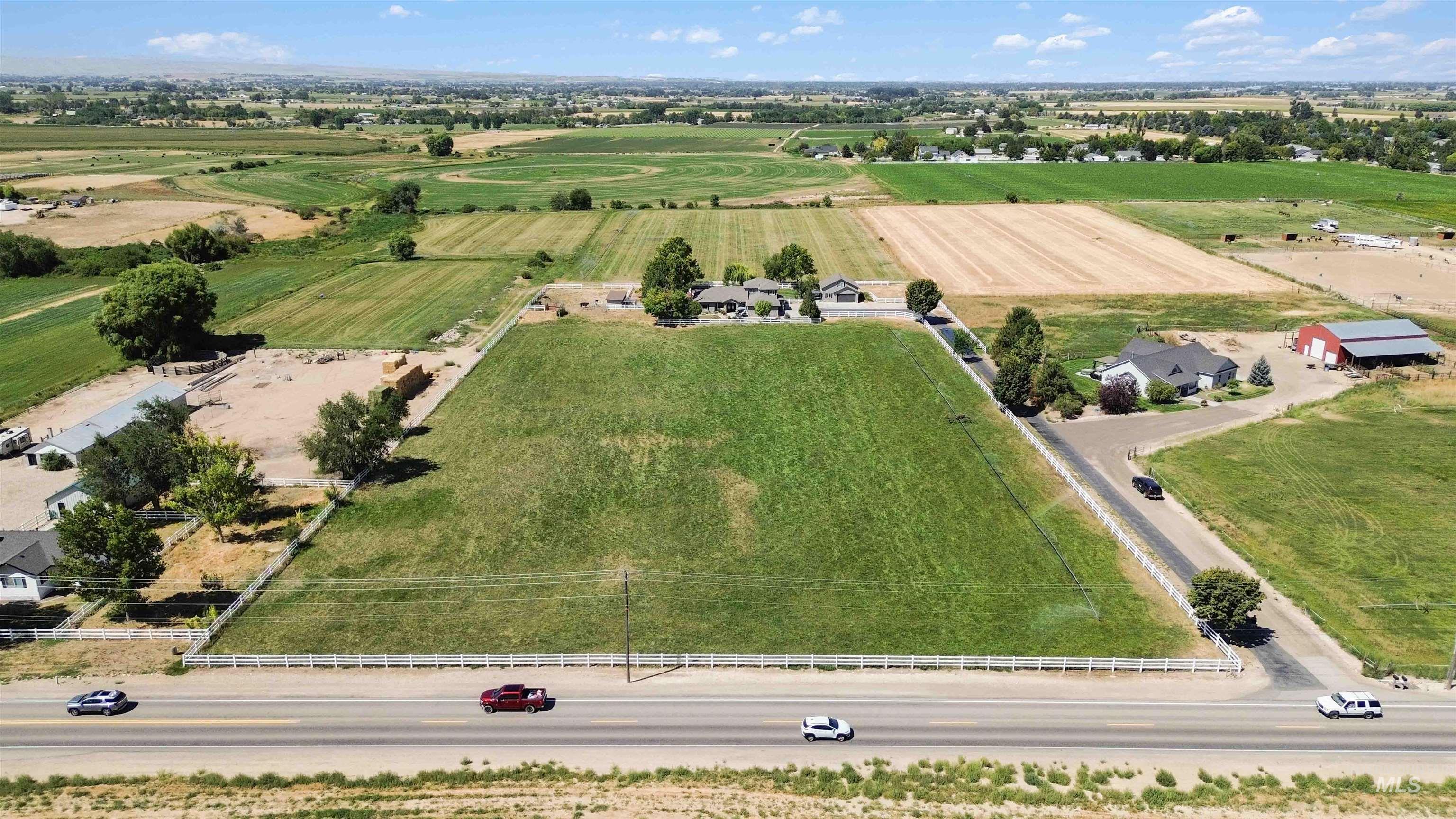 Overview of rural landscape featuring extensive farmland