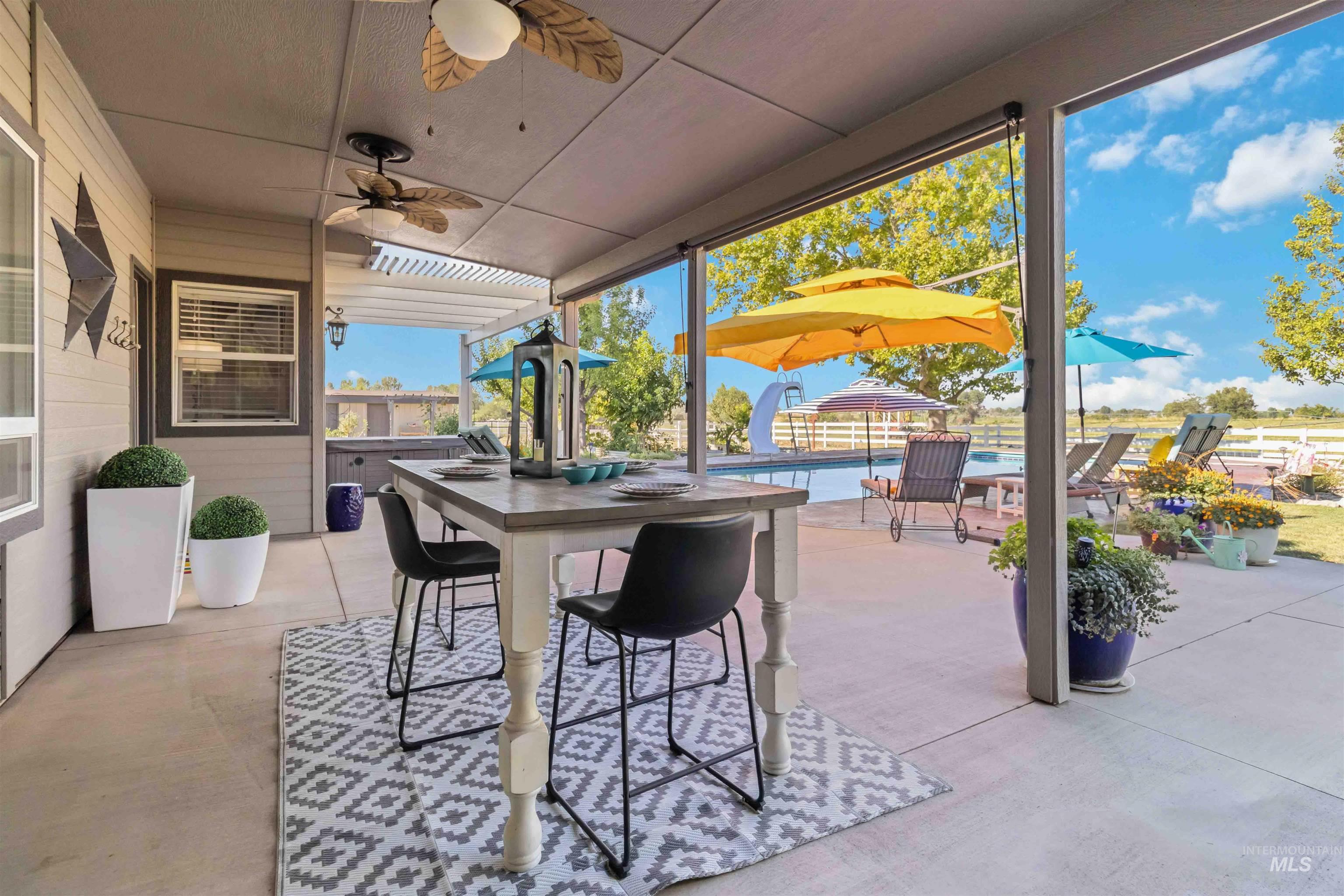 View of patio featuring an outdoor pool