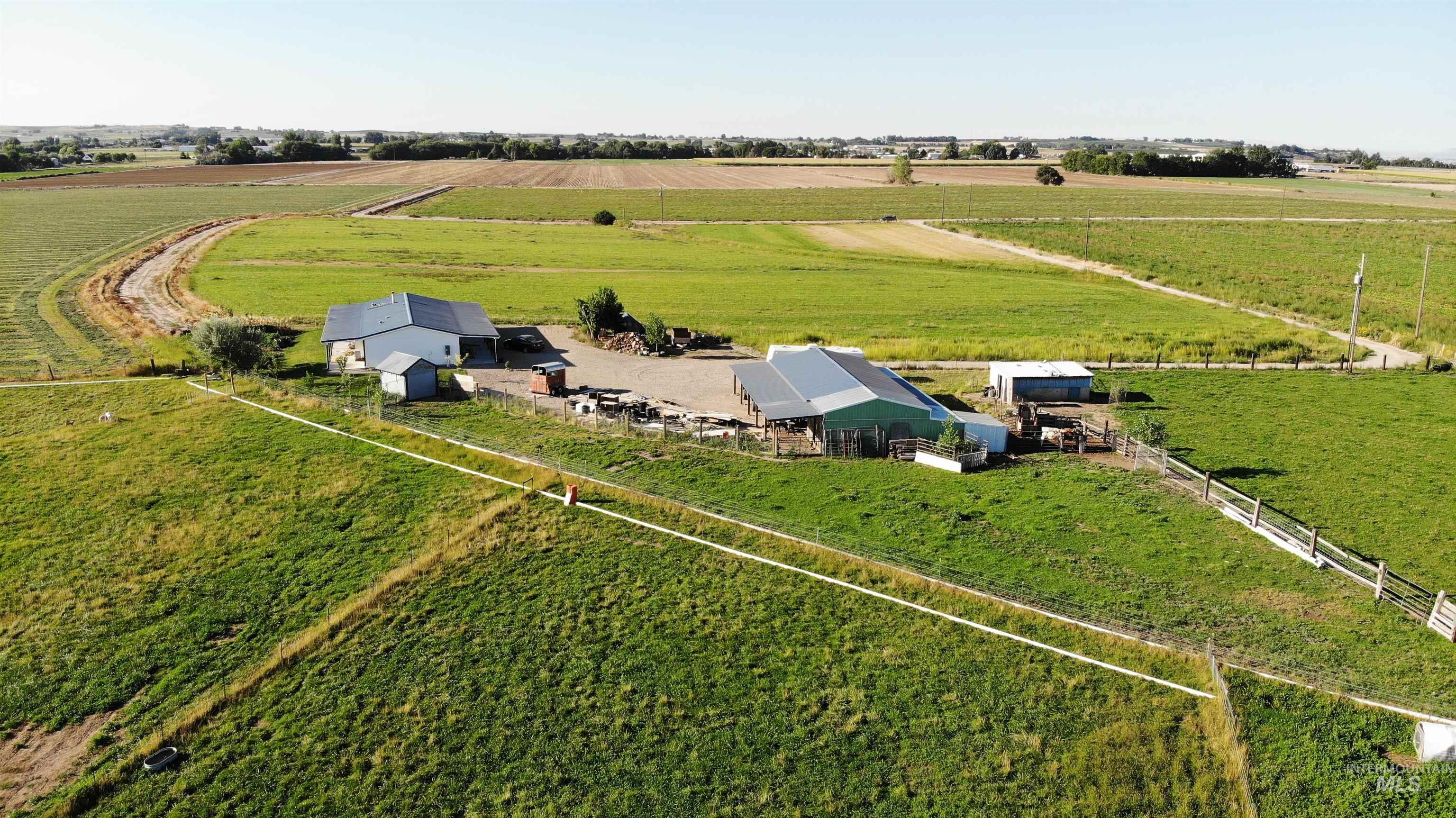 Aerial view of sparsely populated area with farmland