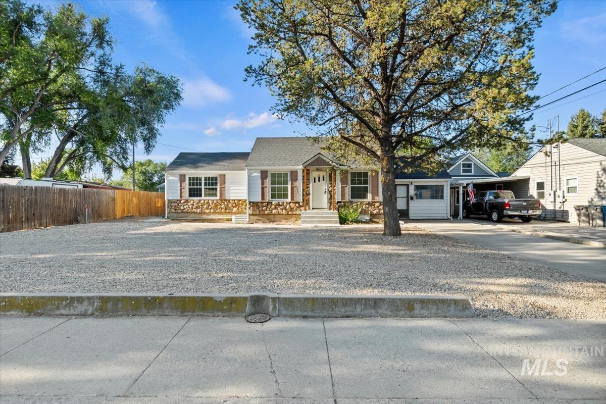 View of front of home featuring concrete driveway