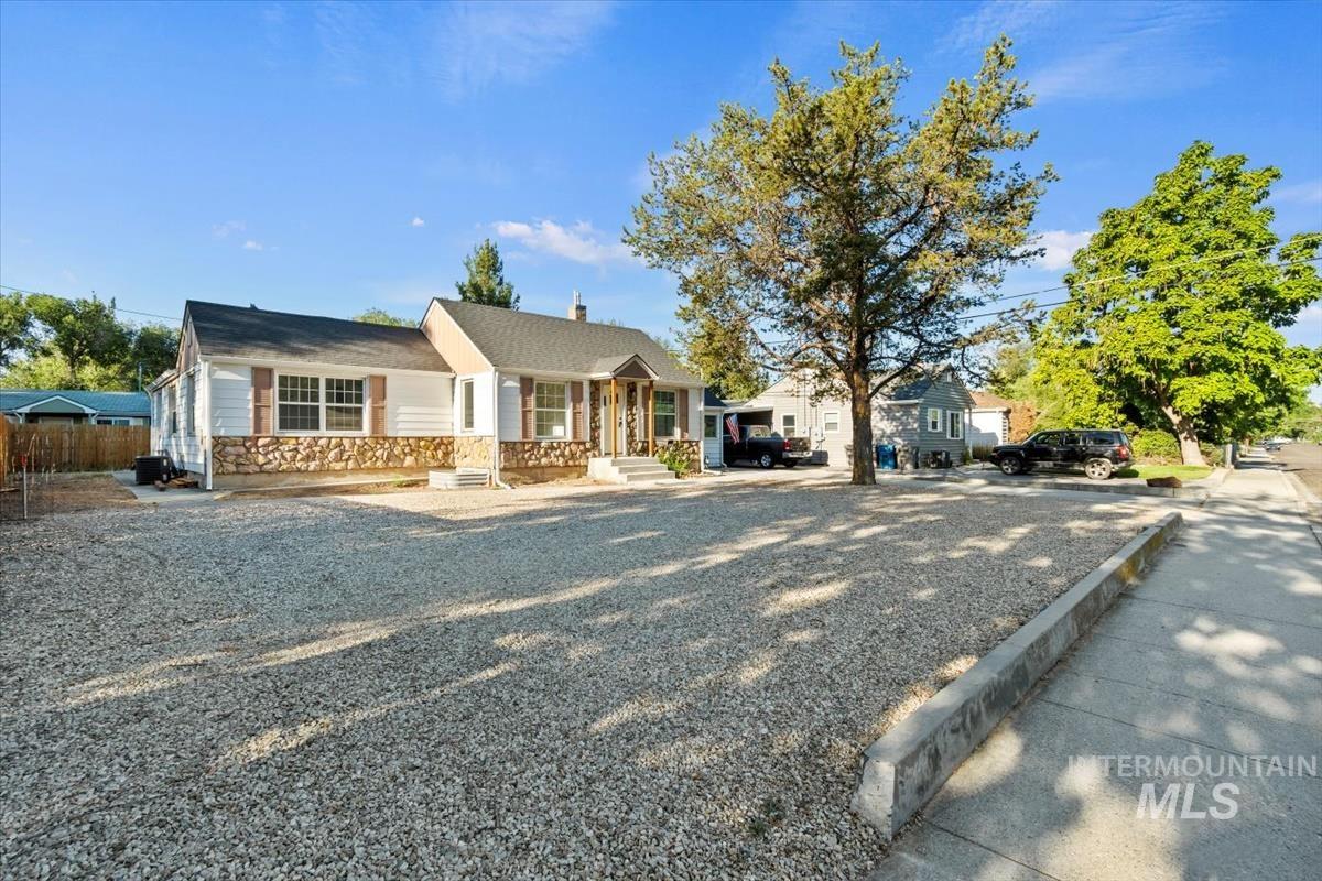 View of front of home with stone siding