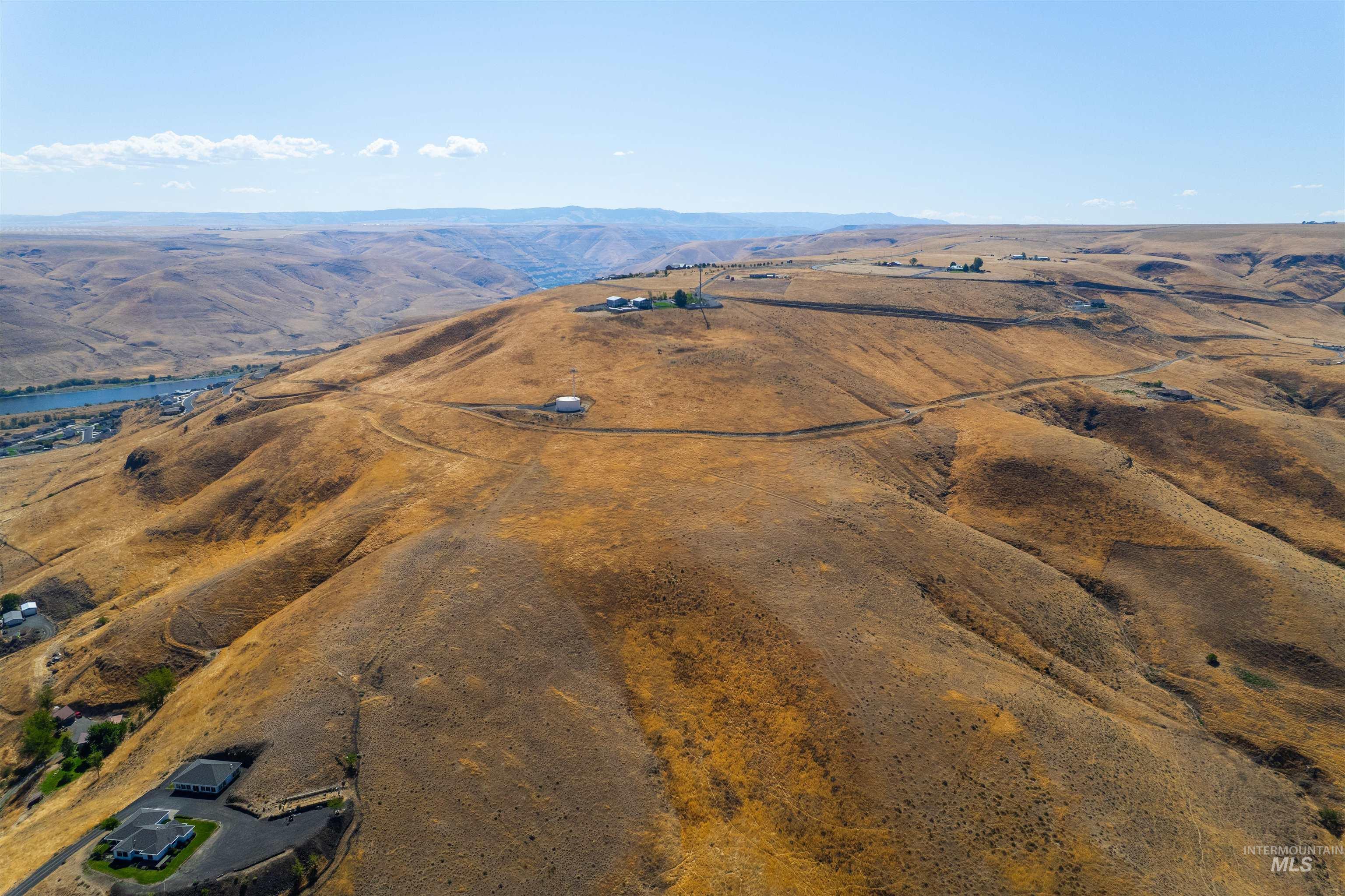 Overview of rural landscape with a mountainous background