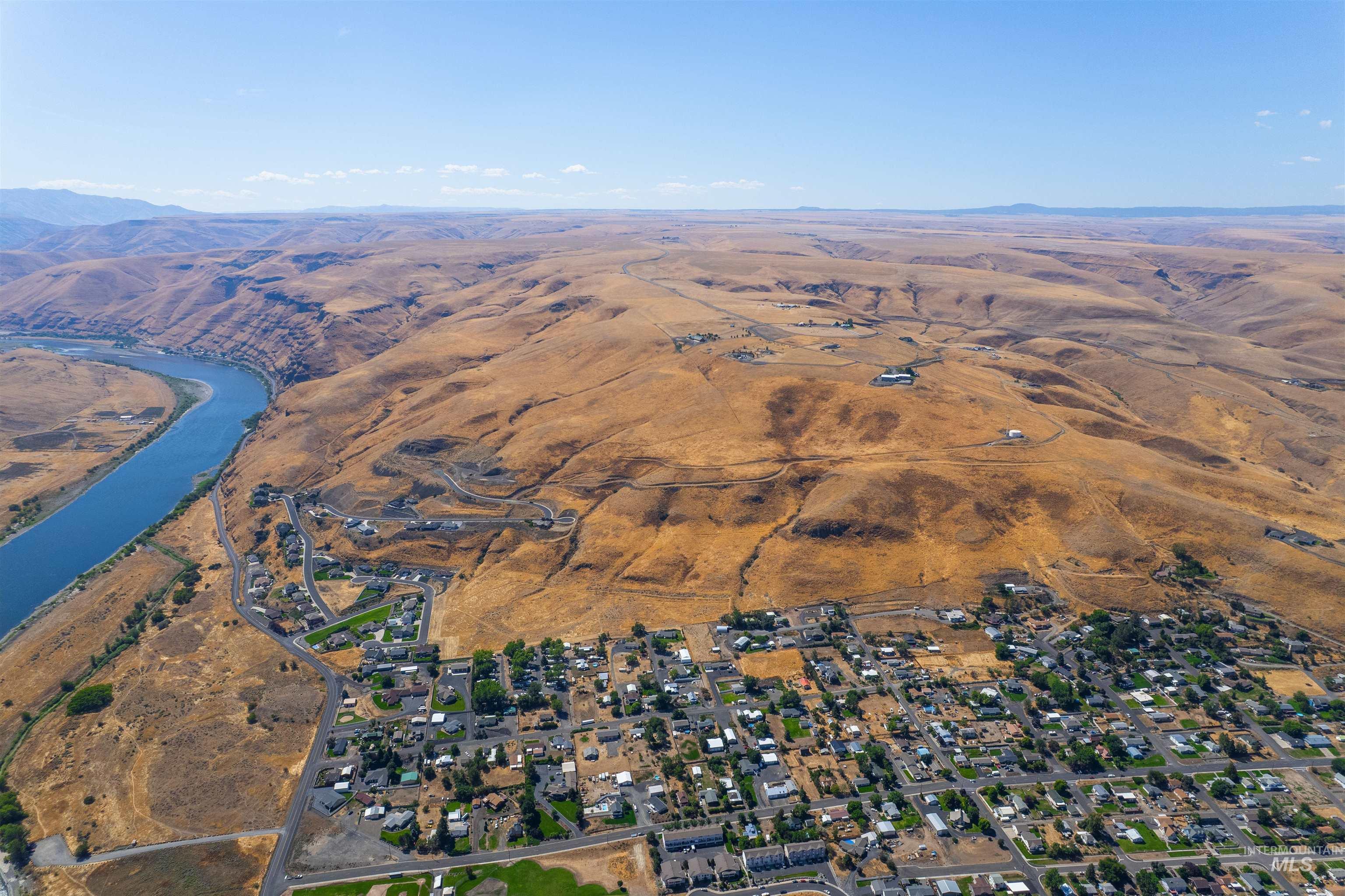 Aerial overview of property's location featuring mountains