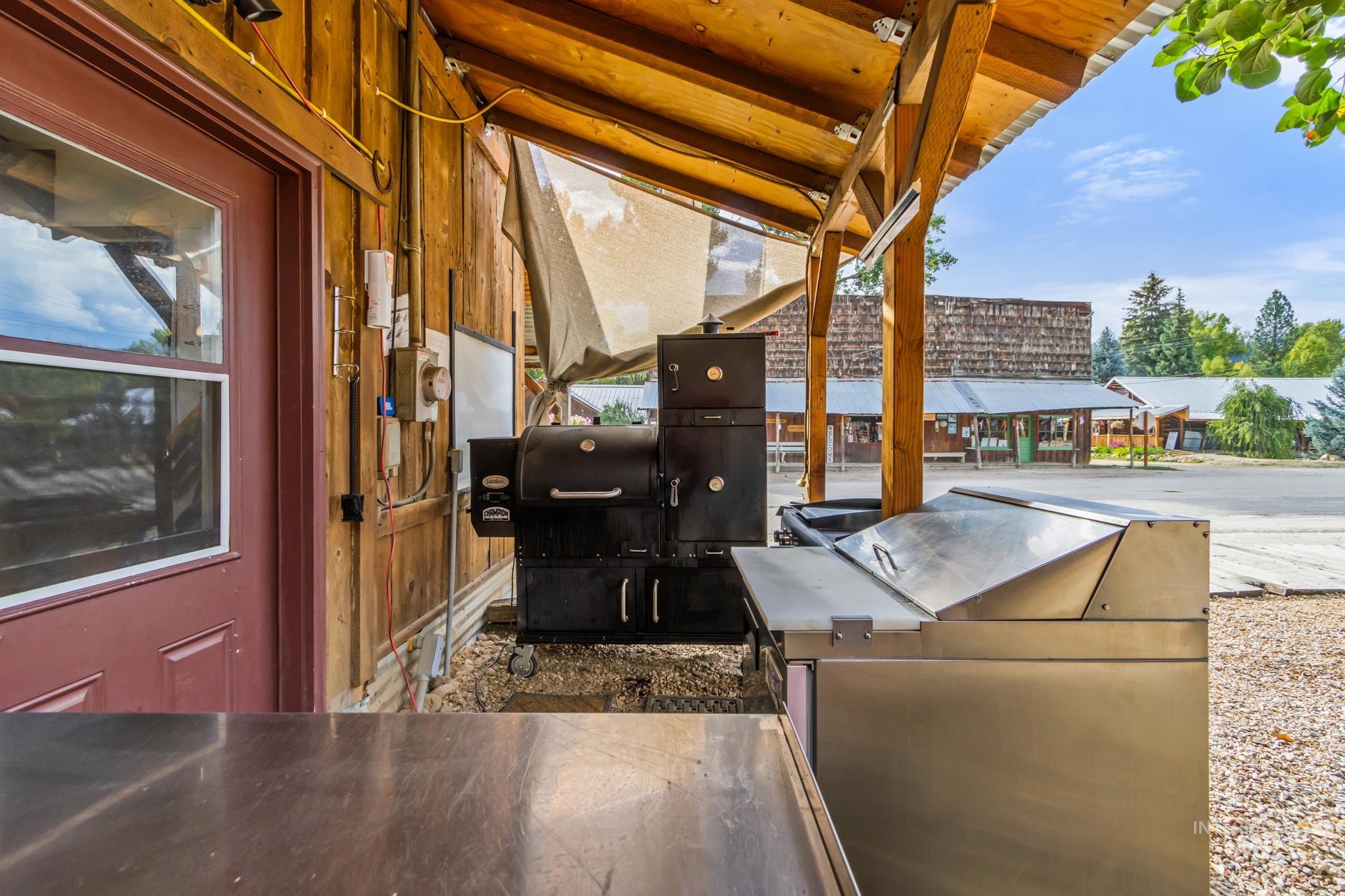 View of patio with exterior kitchen