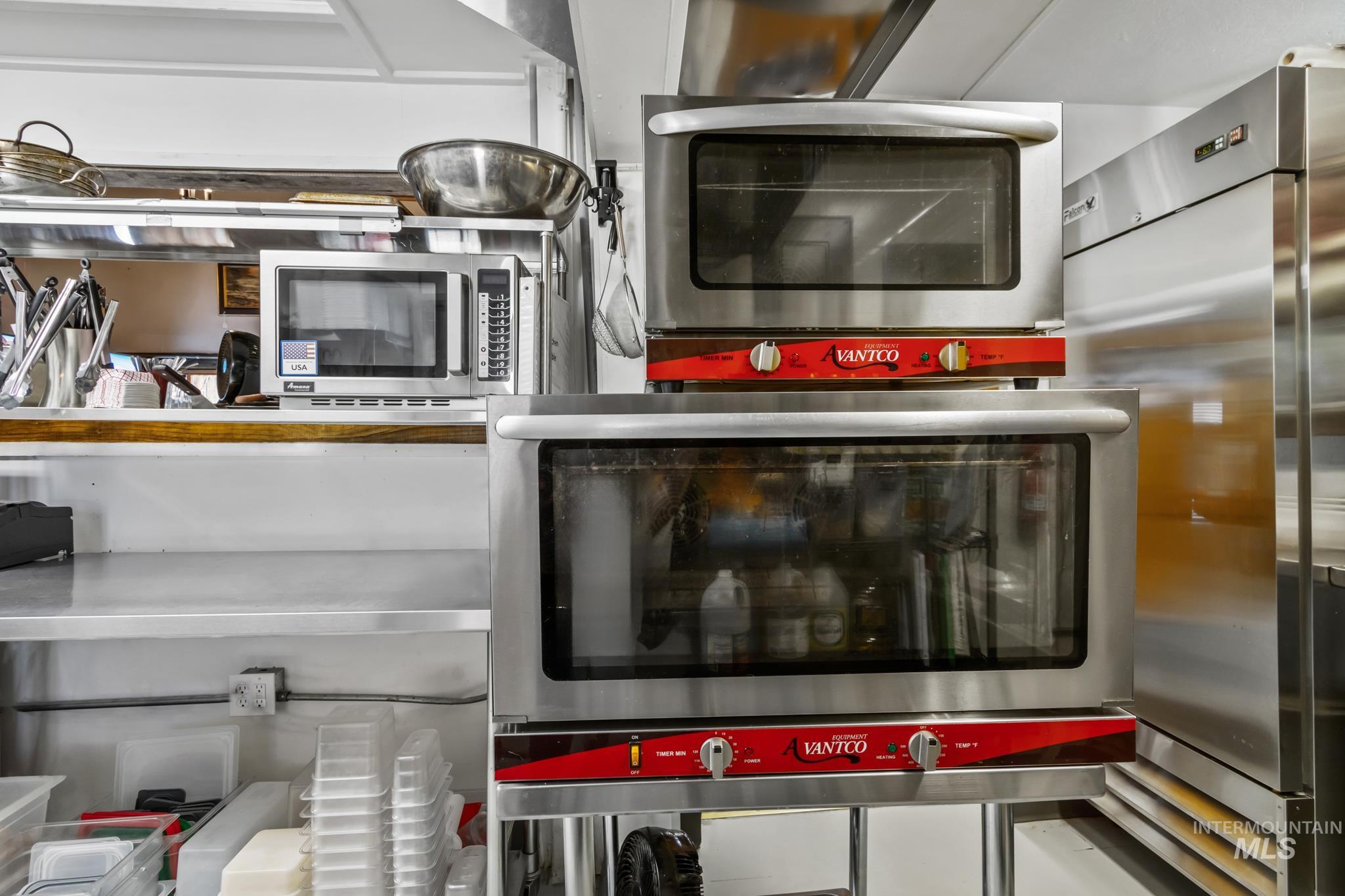 Kitchen view of appliances with stainless steel finishes