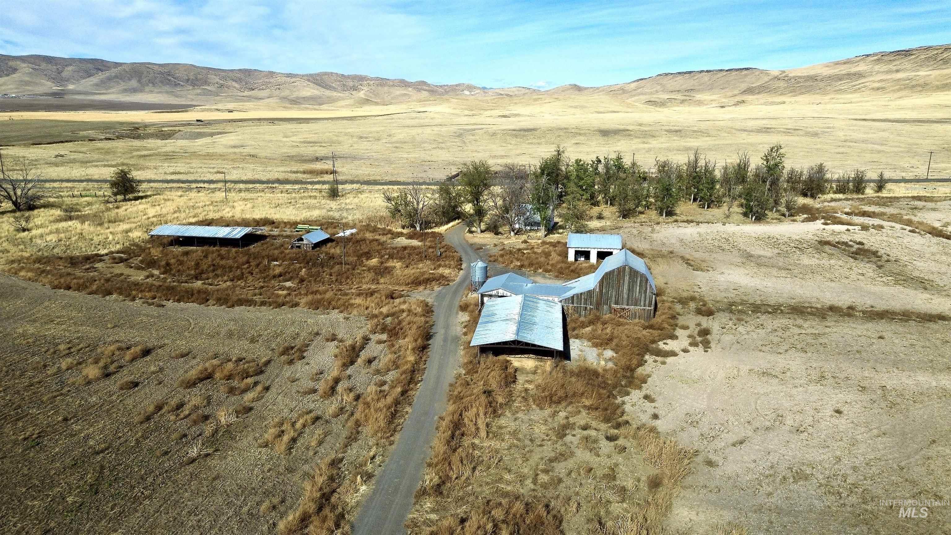 Aerial view of sparsely populated area featuring a mountain backdrop