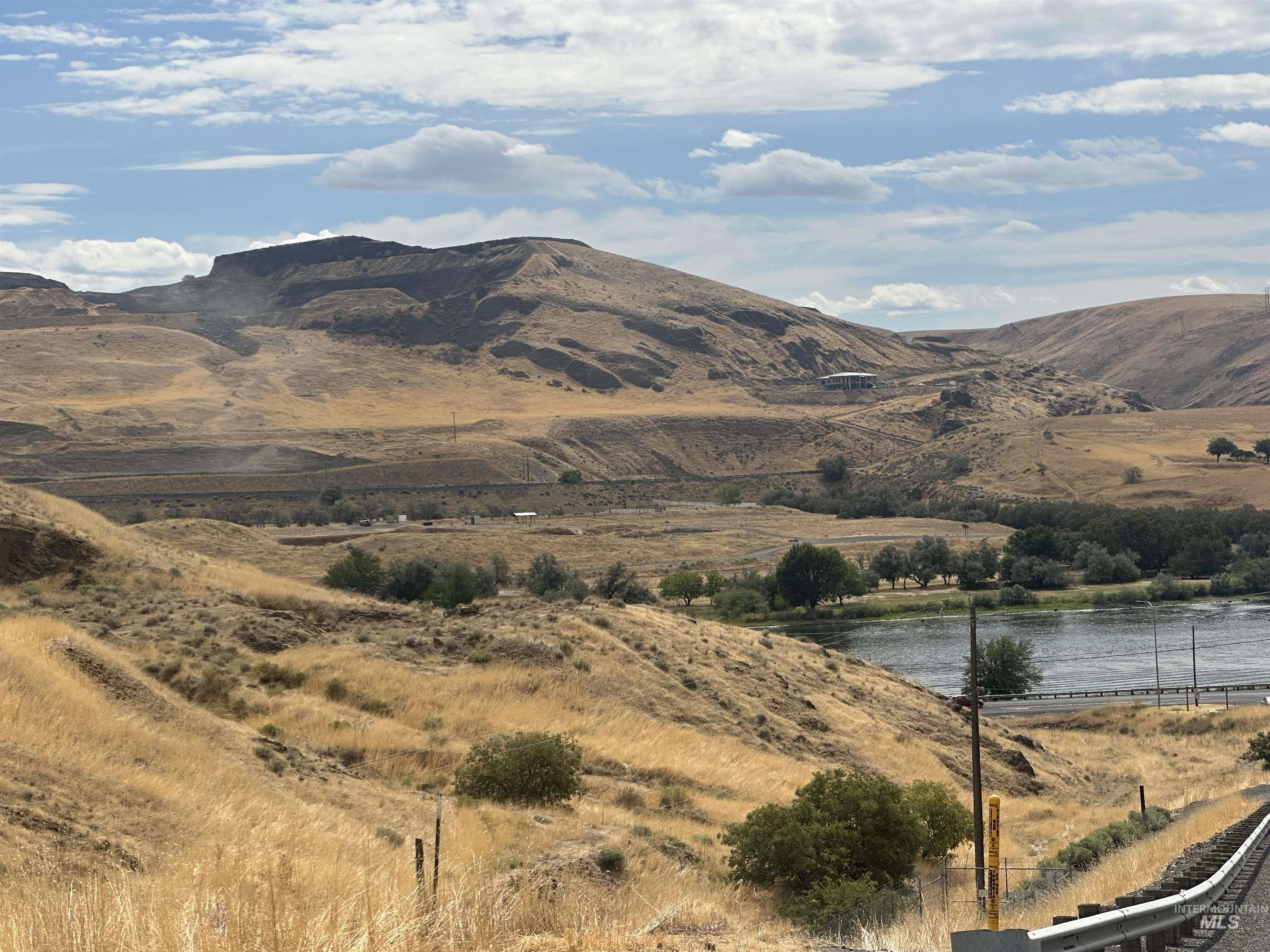 View of mountain backdrop with a large body of water