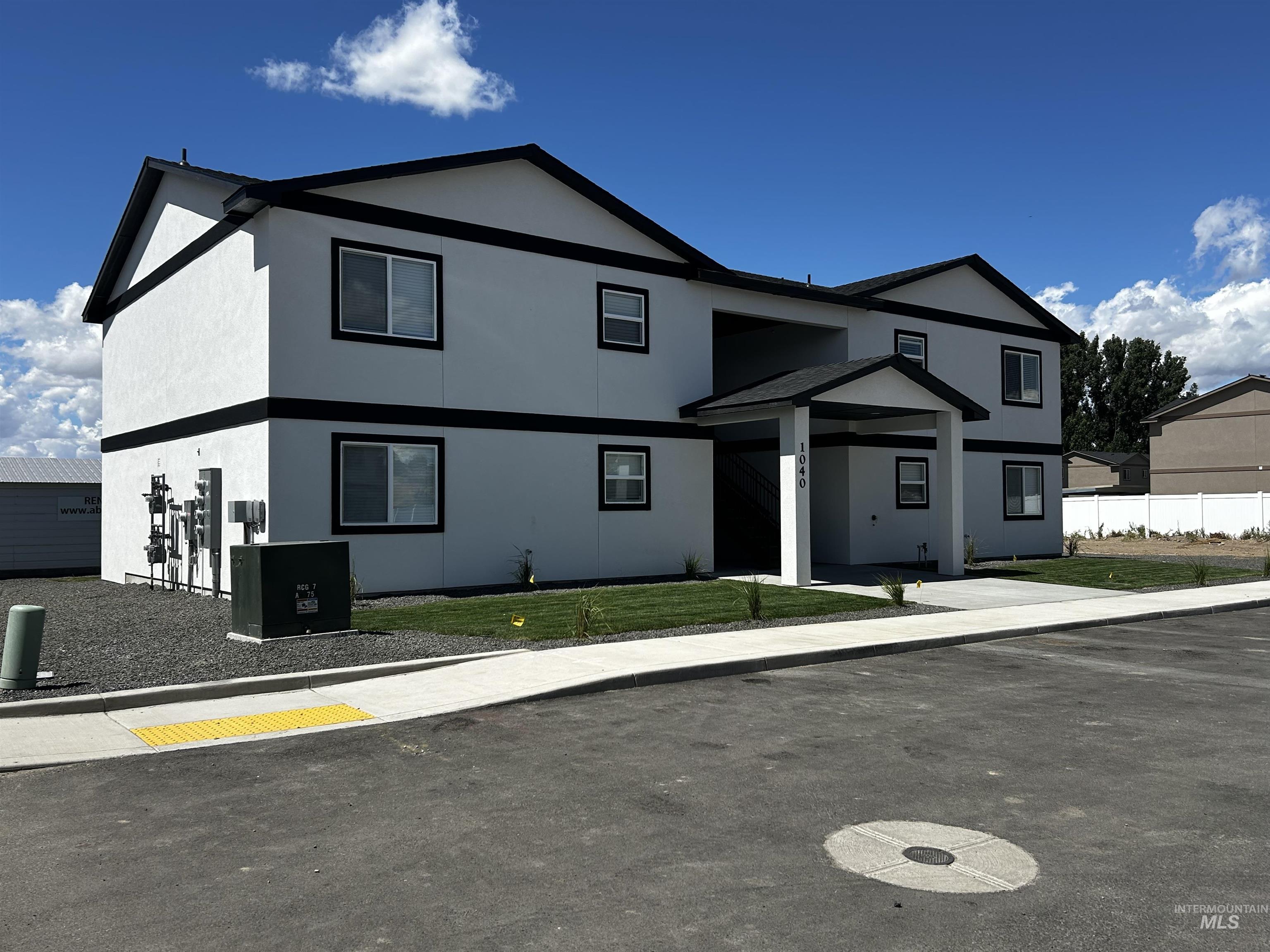 View of front of home with stucco siding