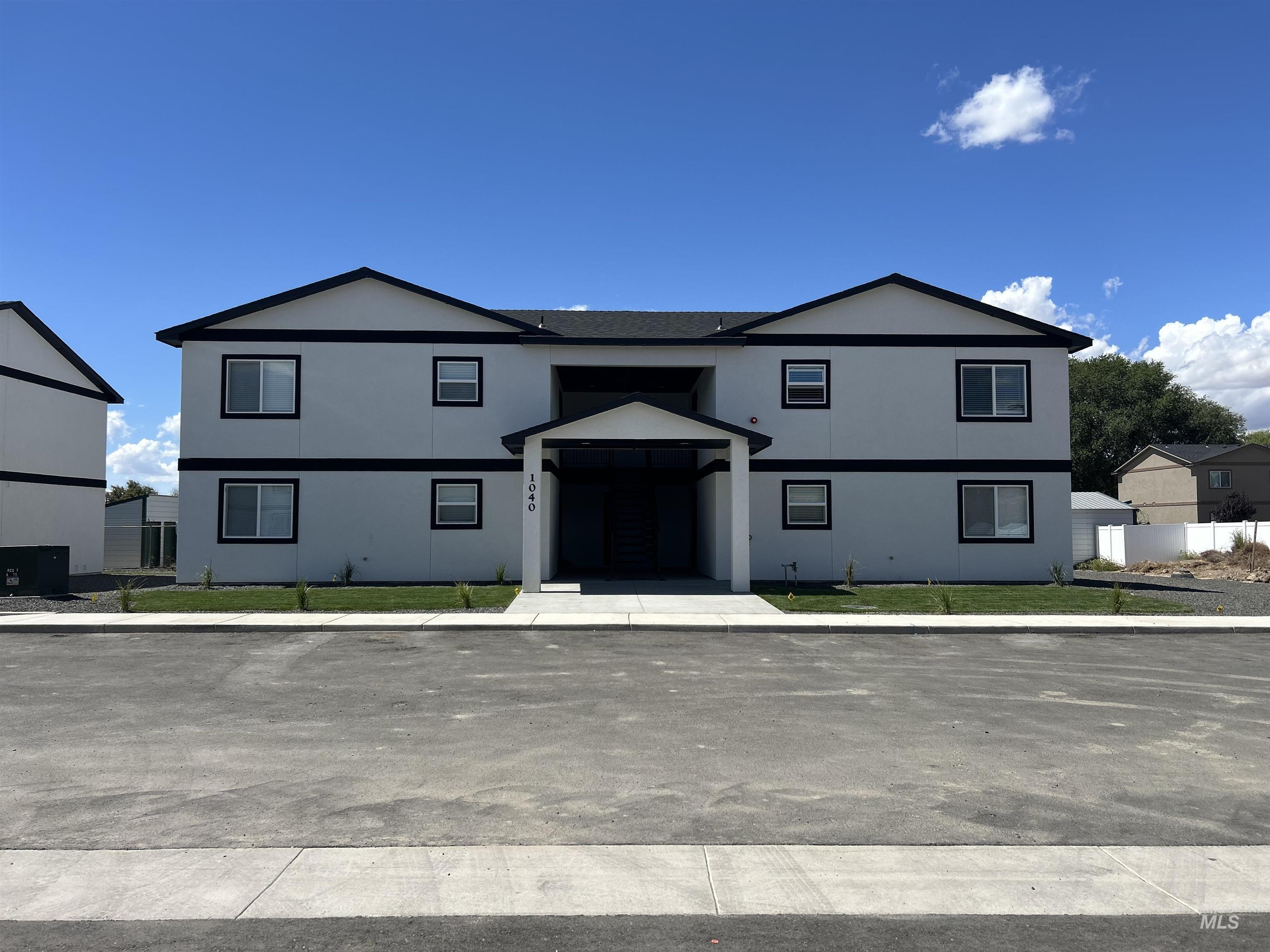 View of front of property featuring a front lawn
